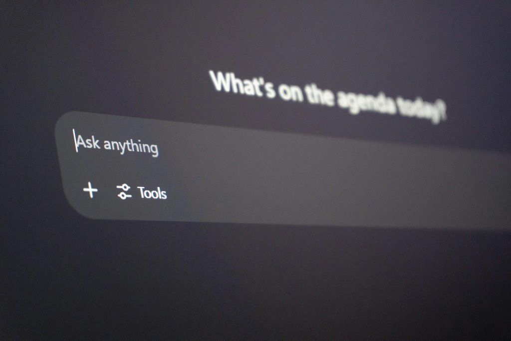 Digital interface with "ask anything" prompt.