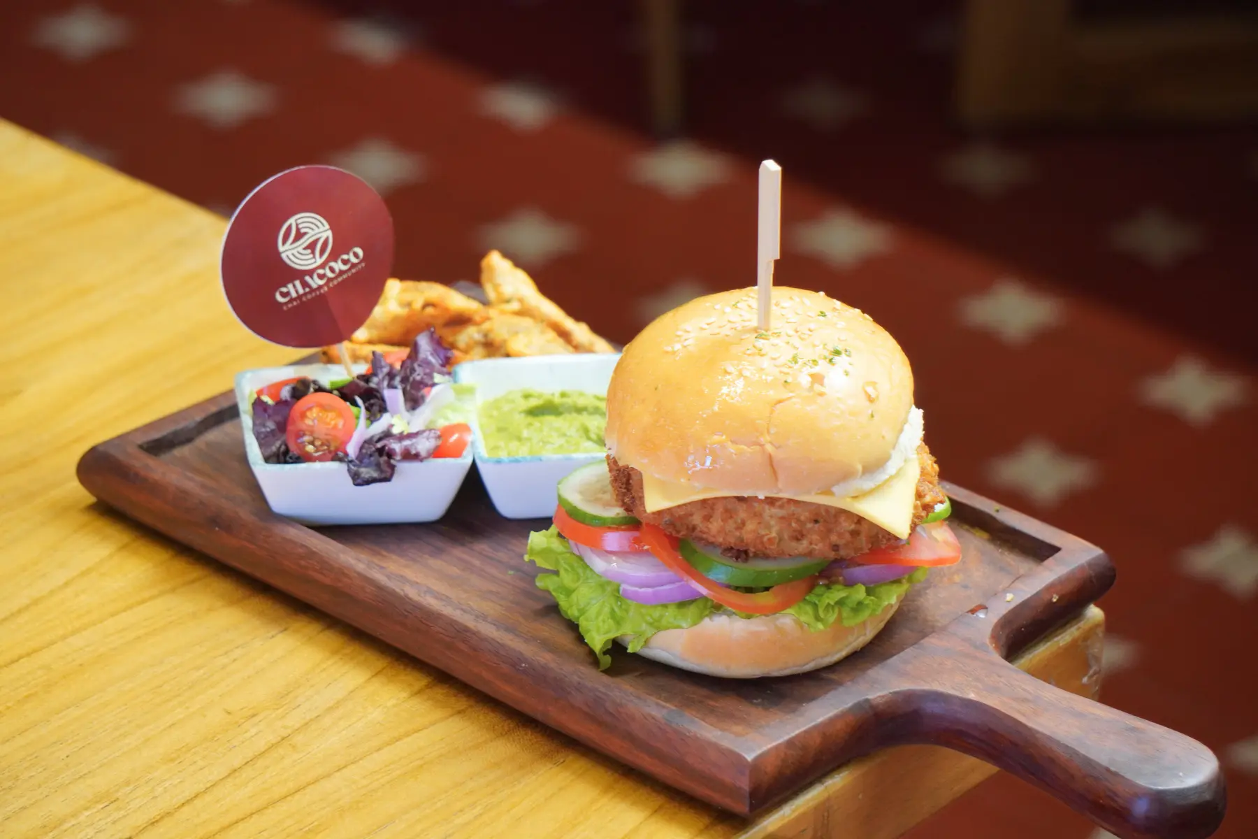 Indie Masala Crunch Burger on a wooden table