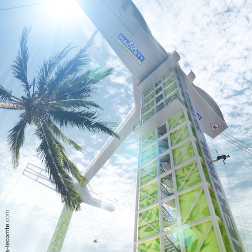 一个人正在从一个带有绿色几何图案的高塔上进行蹦极，背景中有一棵棕榈树和明亮的阳光。