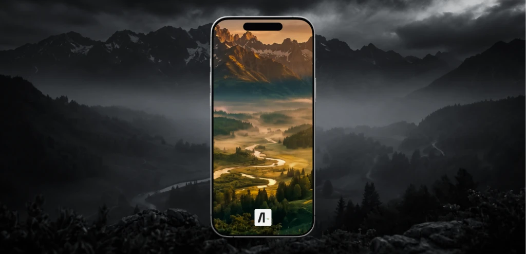 Mockup de iPhone exibindo wallpaper de vale montanhoso ao nascer do sol, com rio sinuoso, névoa e floresta, sobre fundo desfocado de montanhas escuras.