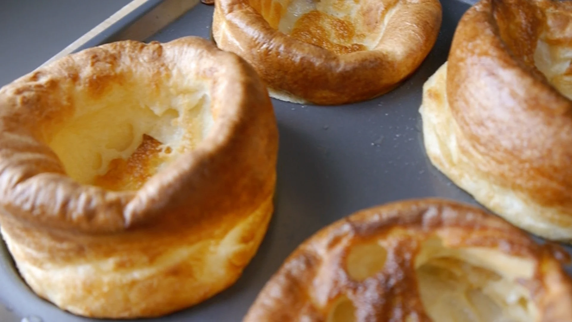 Yorkshire puddings on a baking tray