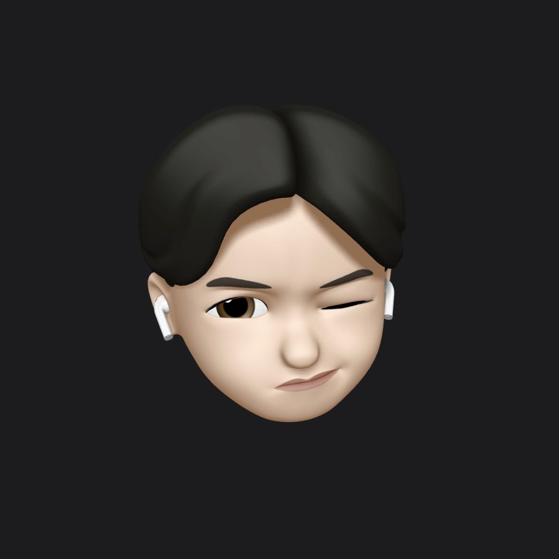 A woman with short, curly hair, wearing round glasses and a white t-shirt, smiling.