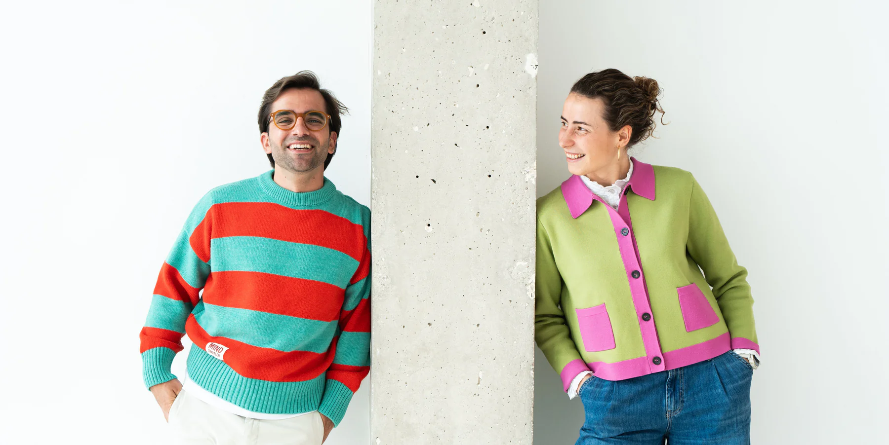 man in white and black crew neck t-shirt and blue denim jeans