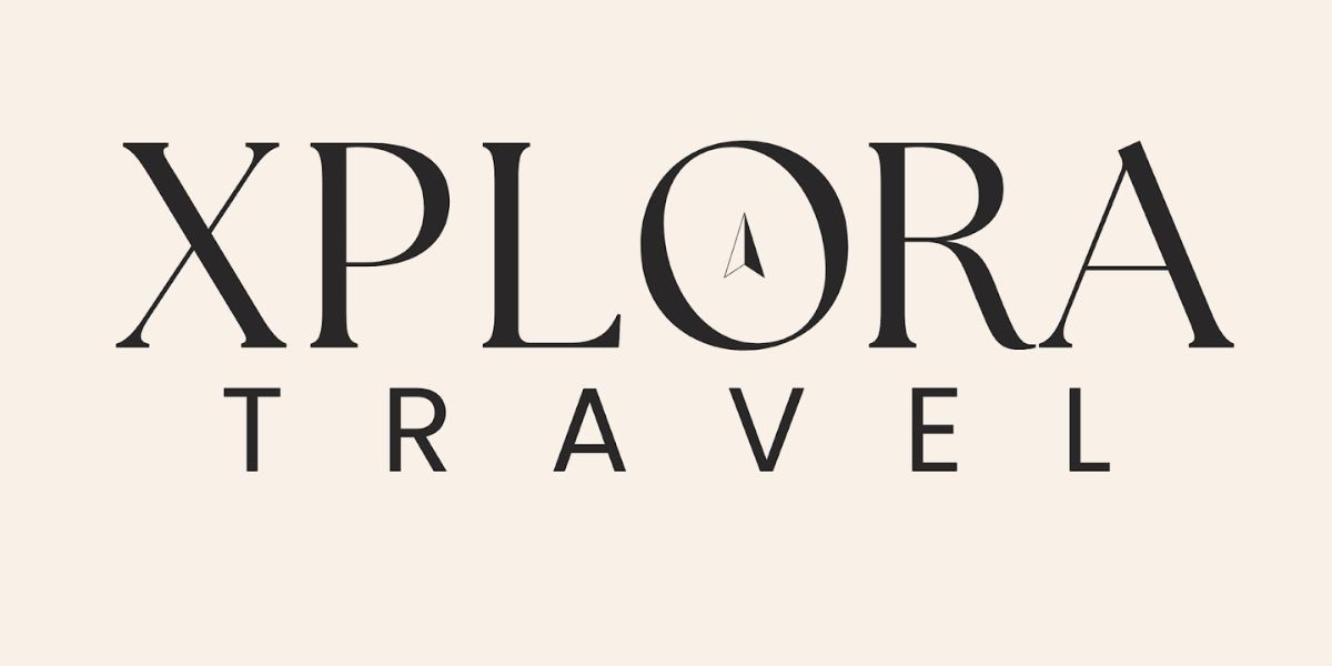 Logo of Xplora Travel, a company focused on immersive and culturally rich travel experiences designed with purpose and precision.