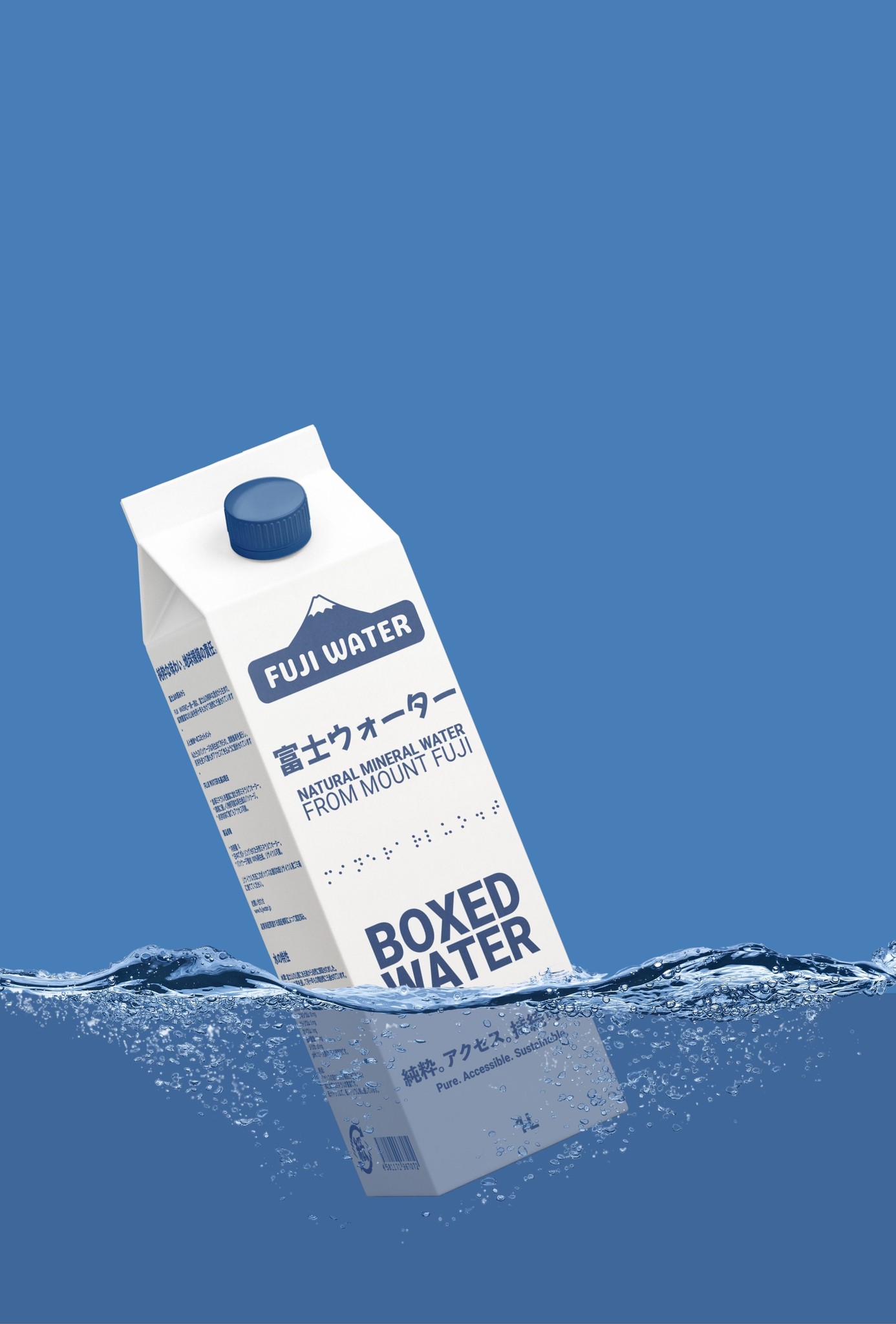 A milk carton partially submerged in blue water, with a clear sky above.