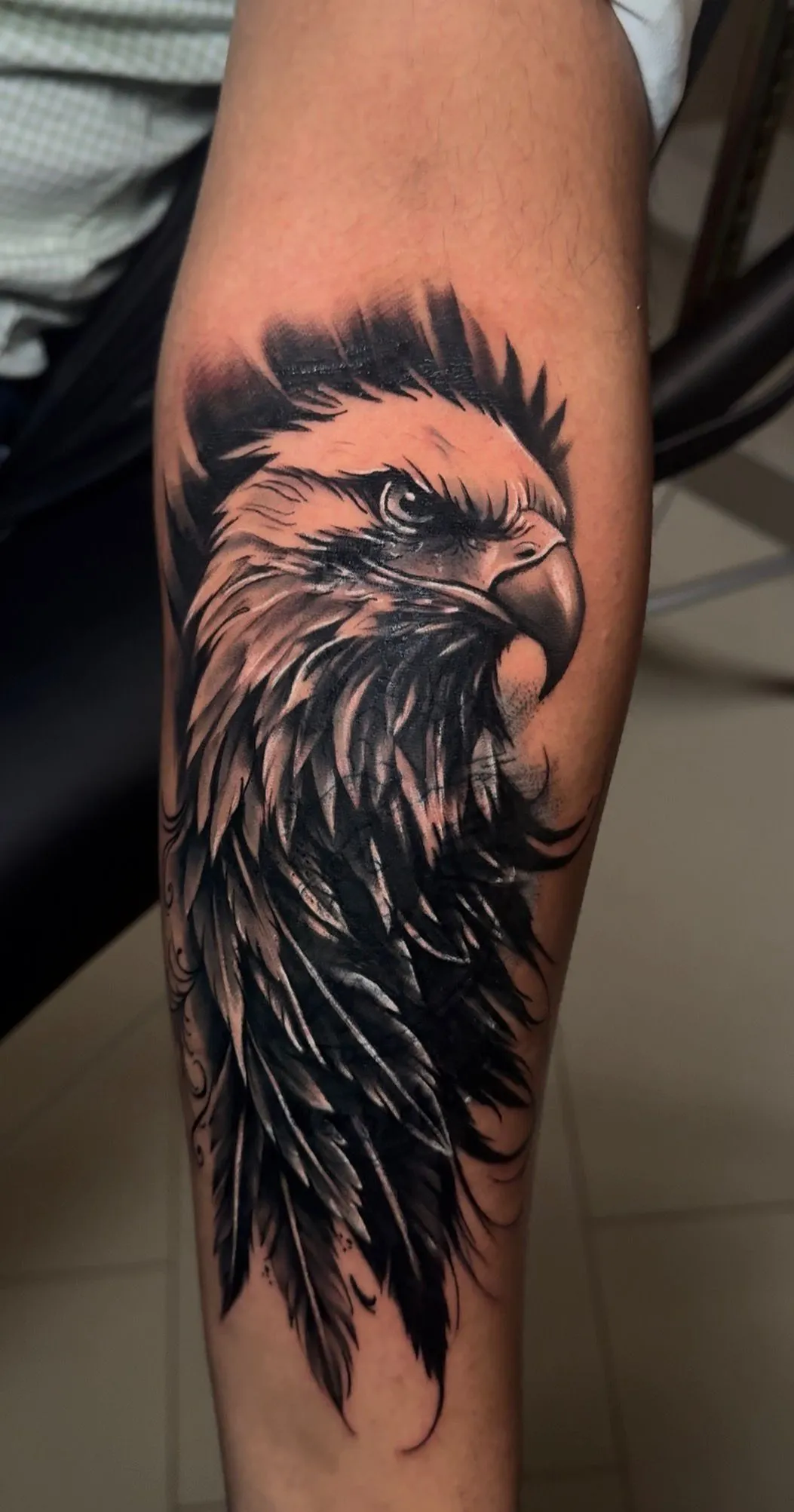 Black and grey eagle tattoo on forearm at Calavera Ink Berlin
