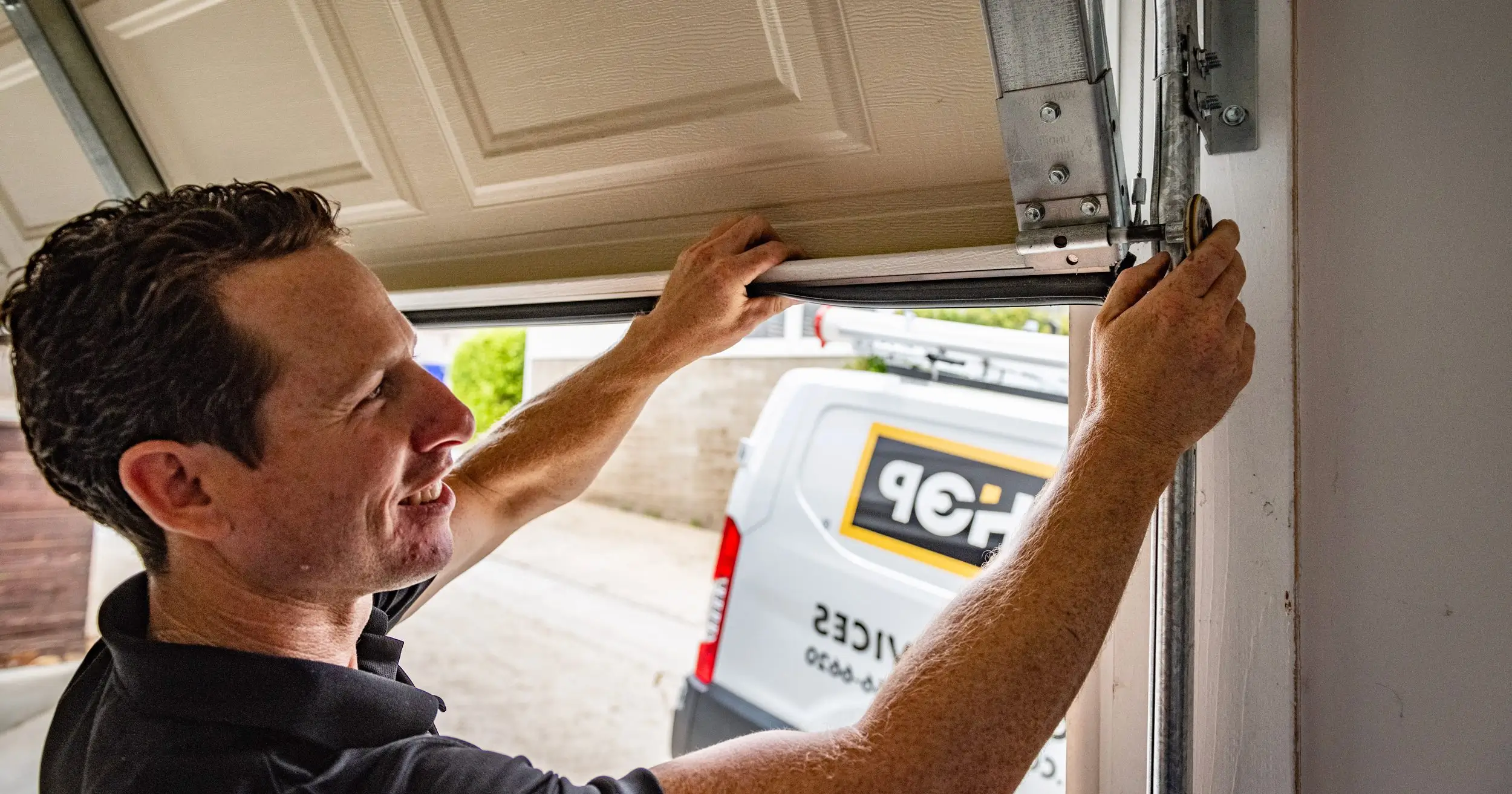 man standing in front of open doorway