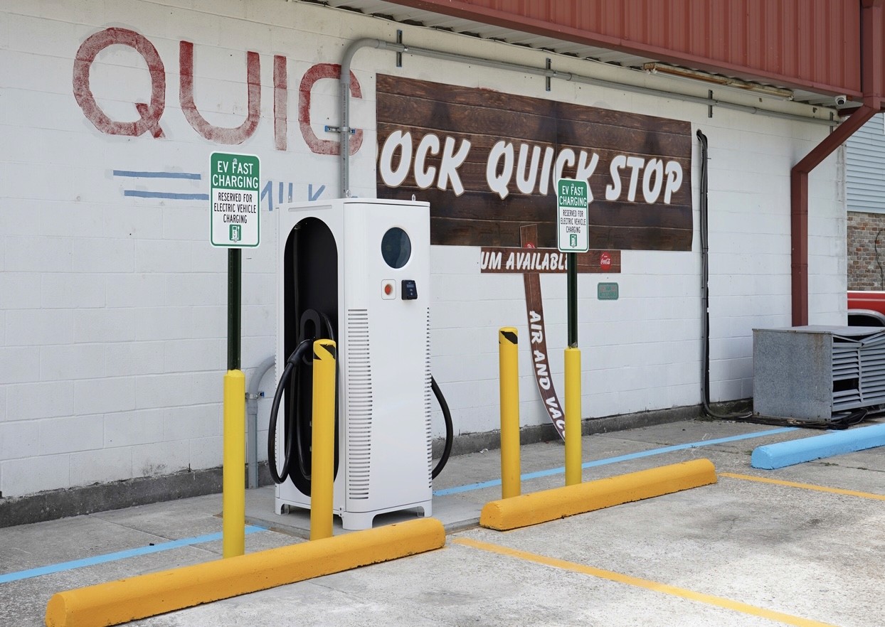 C6AM charger in front of a building
