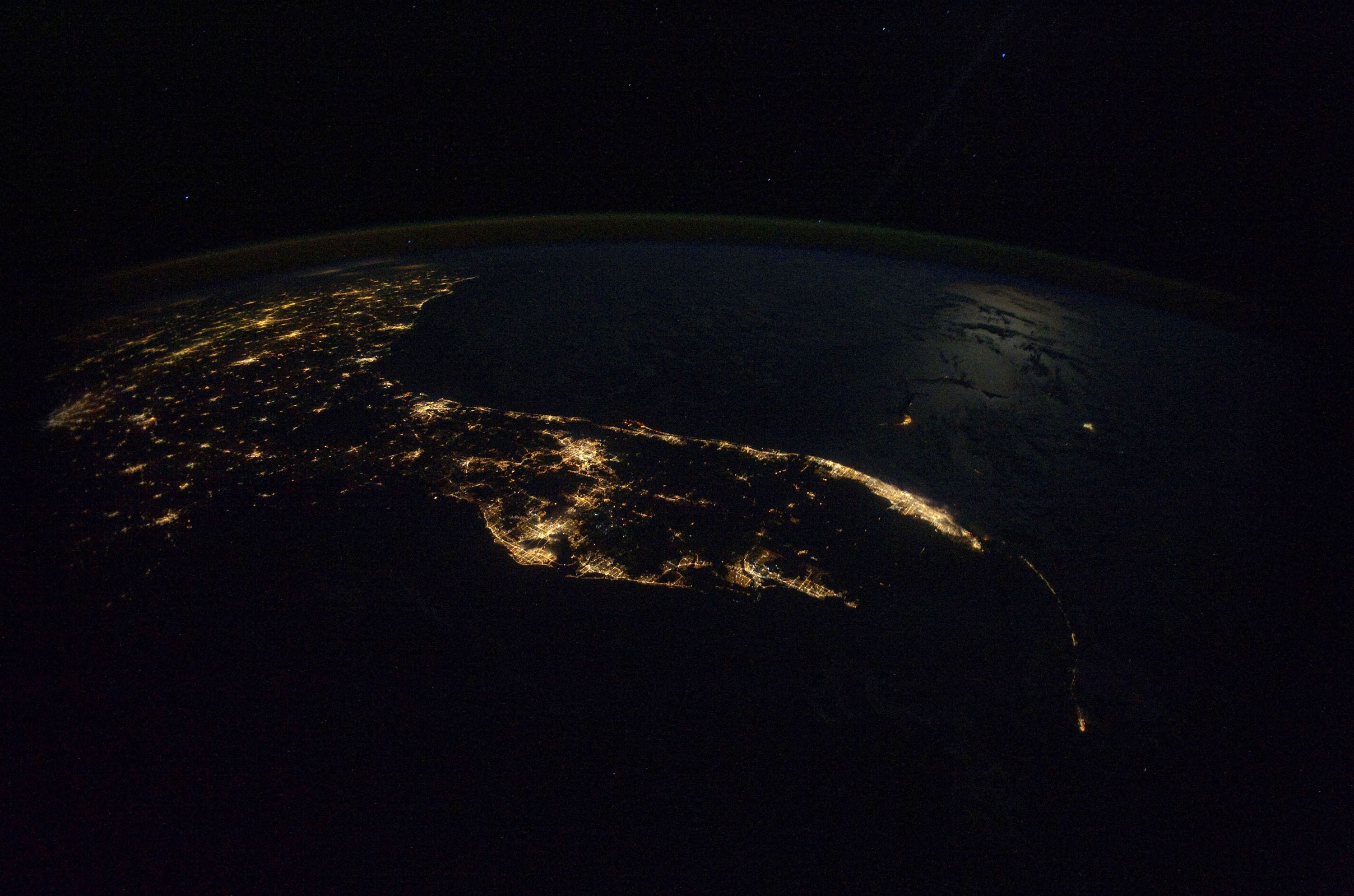 Earth at night with city lights from space
