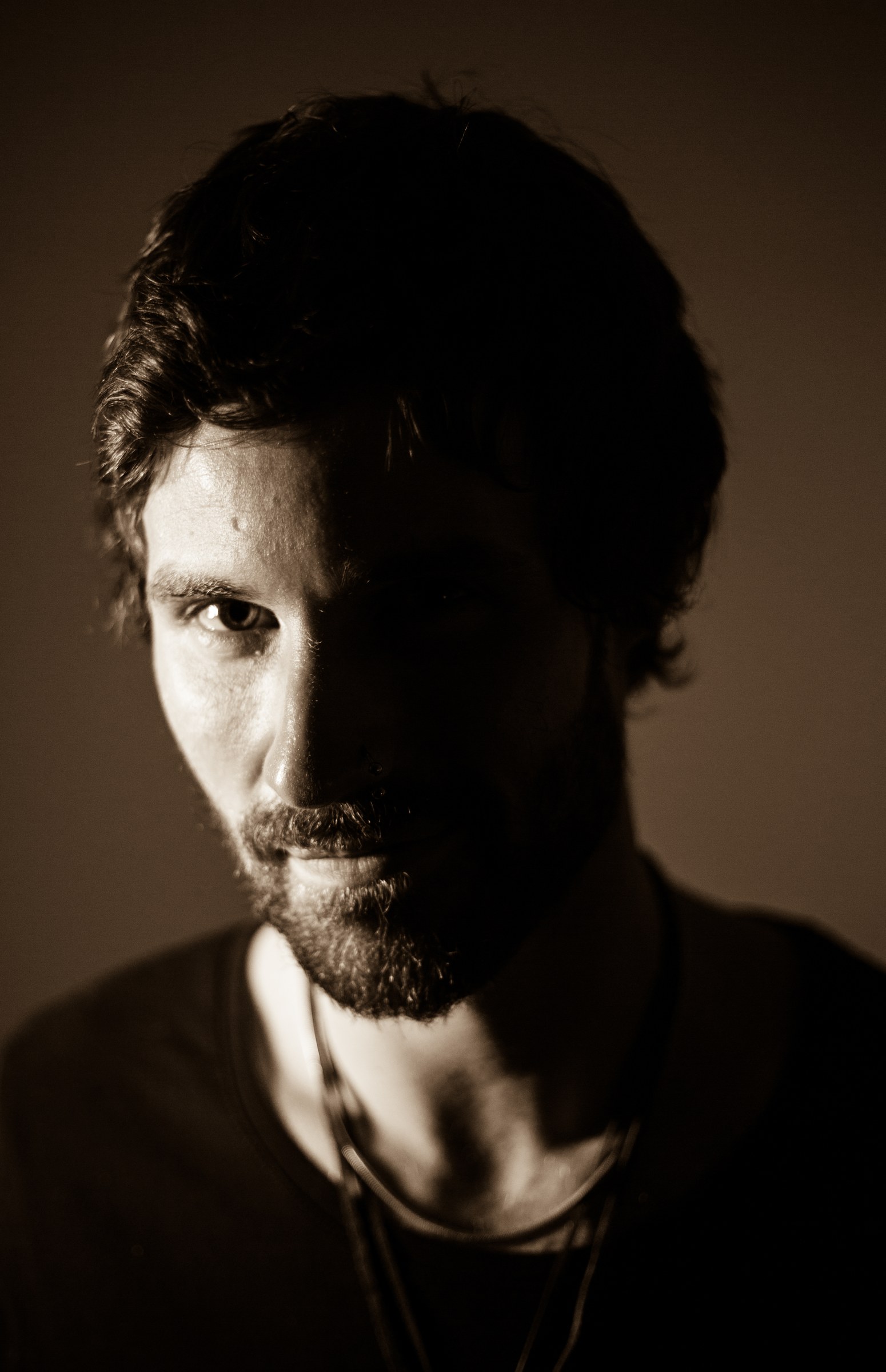 PORTRAITS · A close-up portrait in warm light.