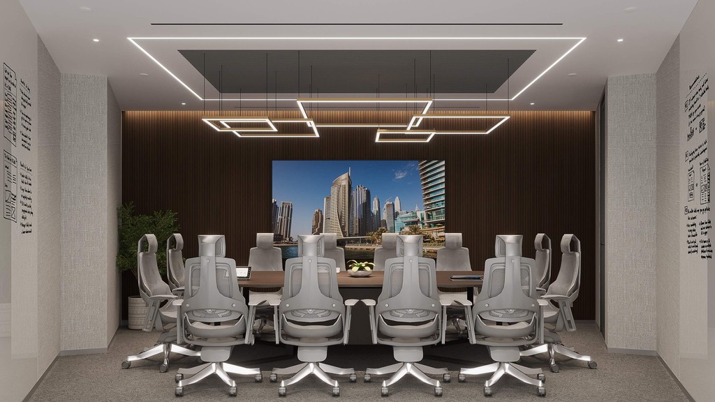 High-tech meeting rooms with presentation screen and elegant lighting for seamless virtual/in-person collaboration.