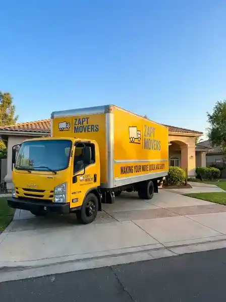 Zapt Movers branded truck arriving at a customer home for moving day