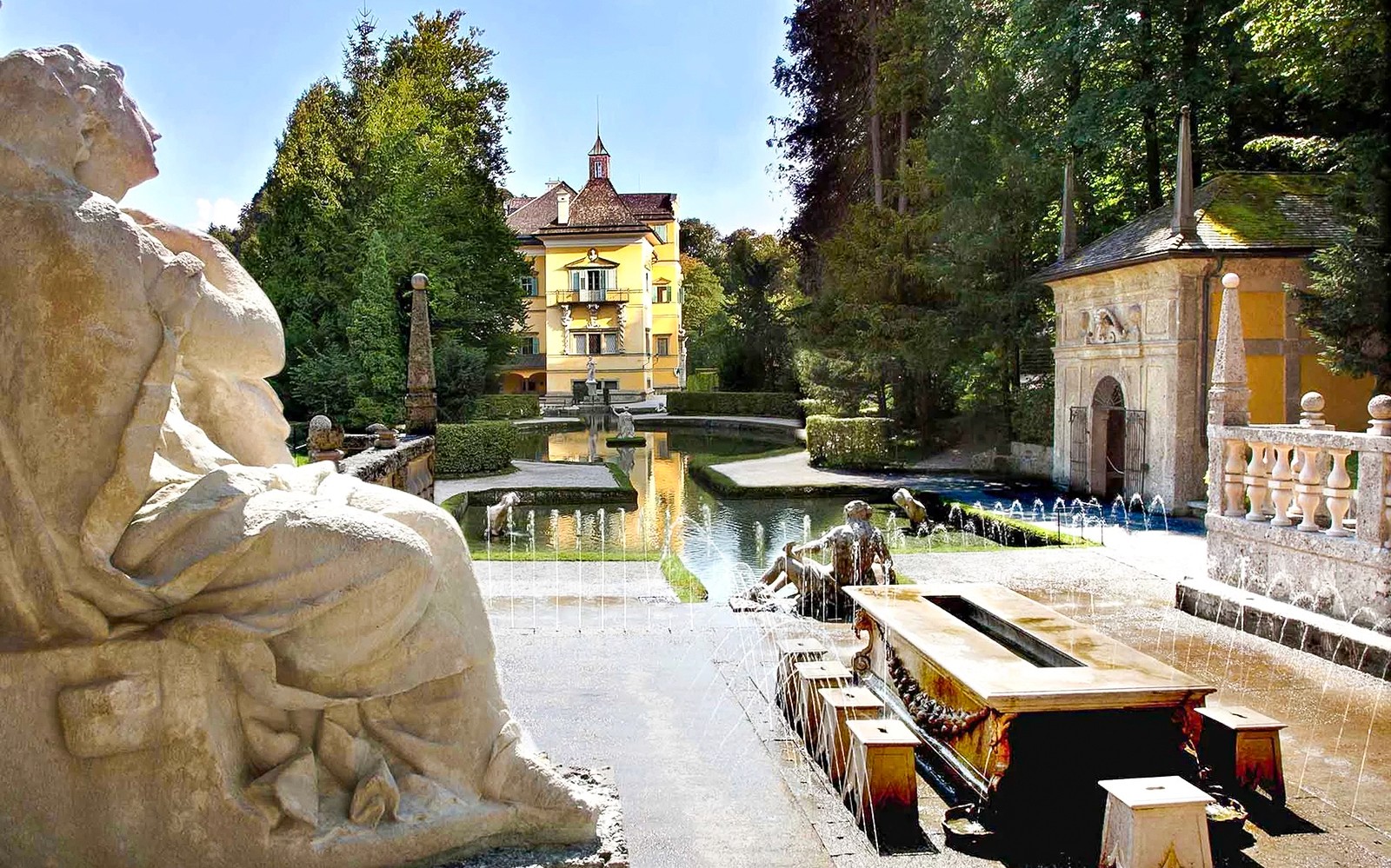 Hellbrunn Palace with water-trick fountains and statues in Salzburg.