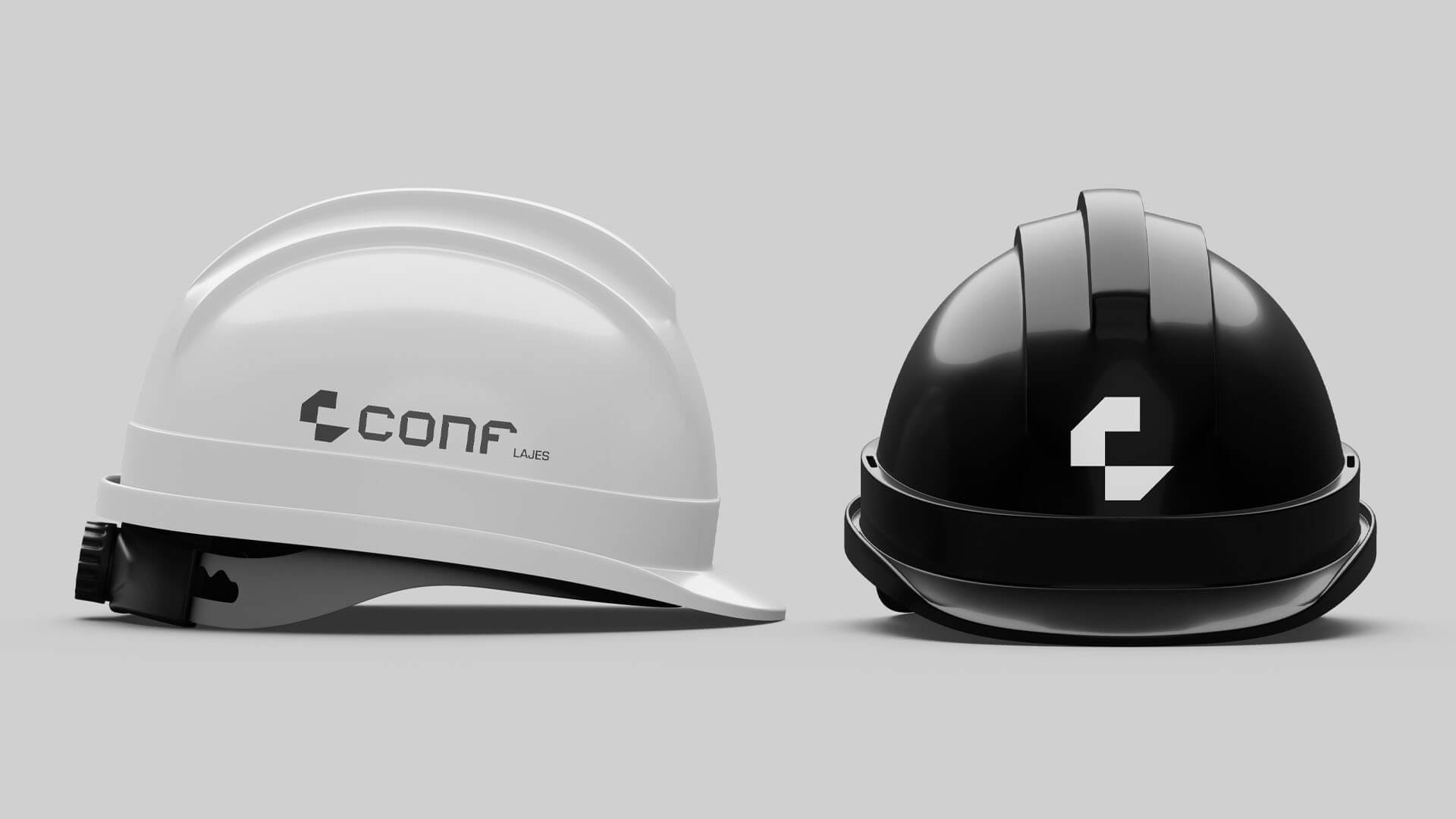 dois capacetes um branco e outro preto com logos da marca