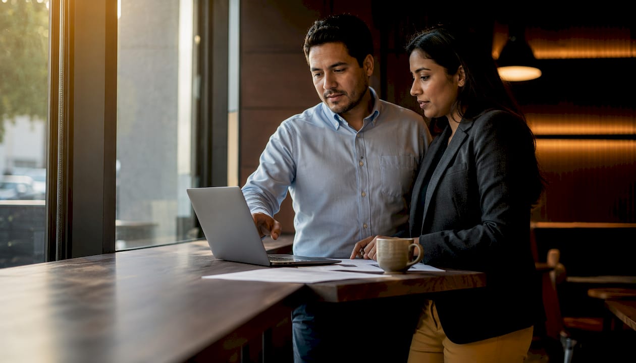Sales and marketing leads collaborating on MQL handoff