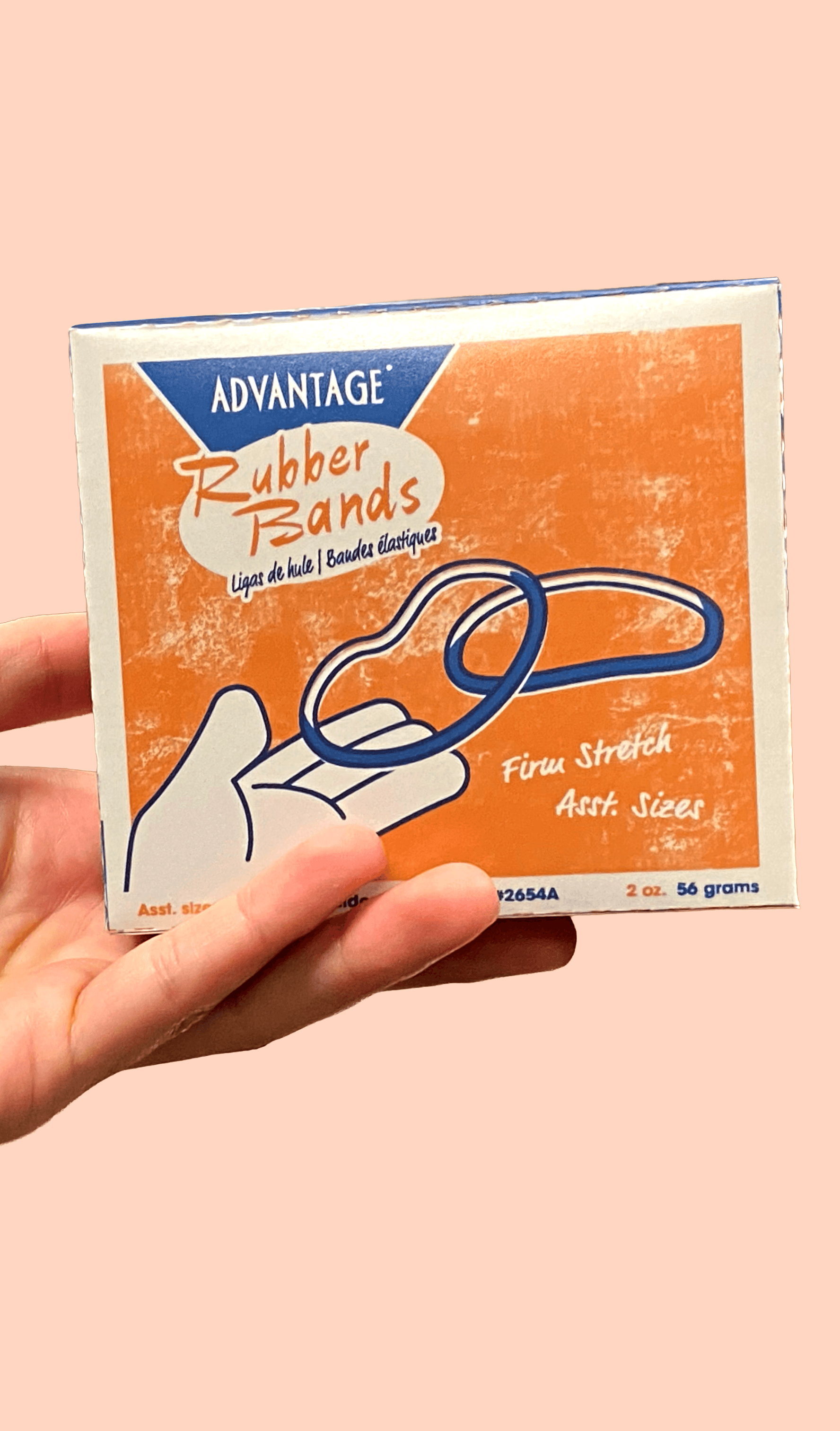 rubber band box held in a hand.