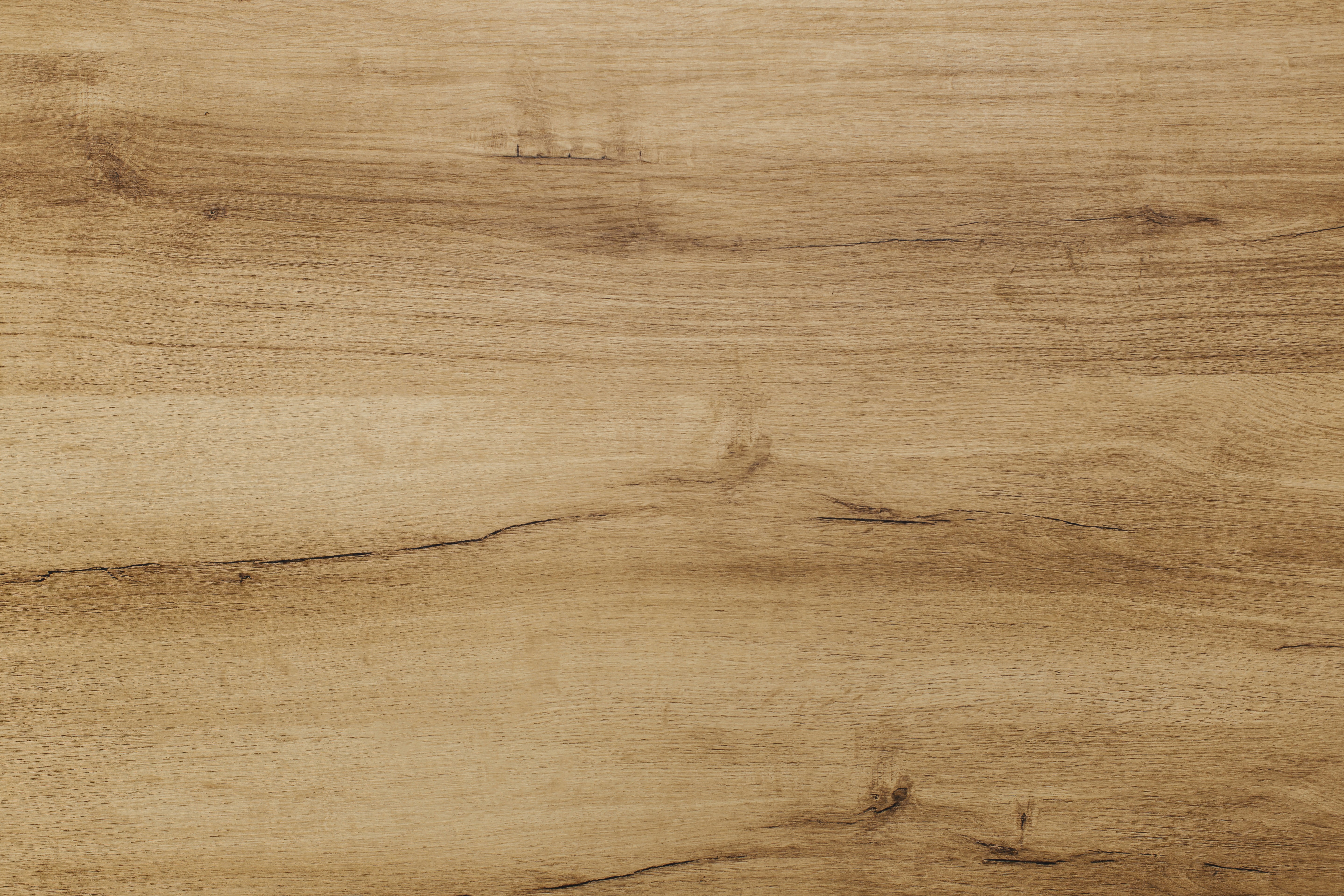 brown wooden surface with white and black textile