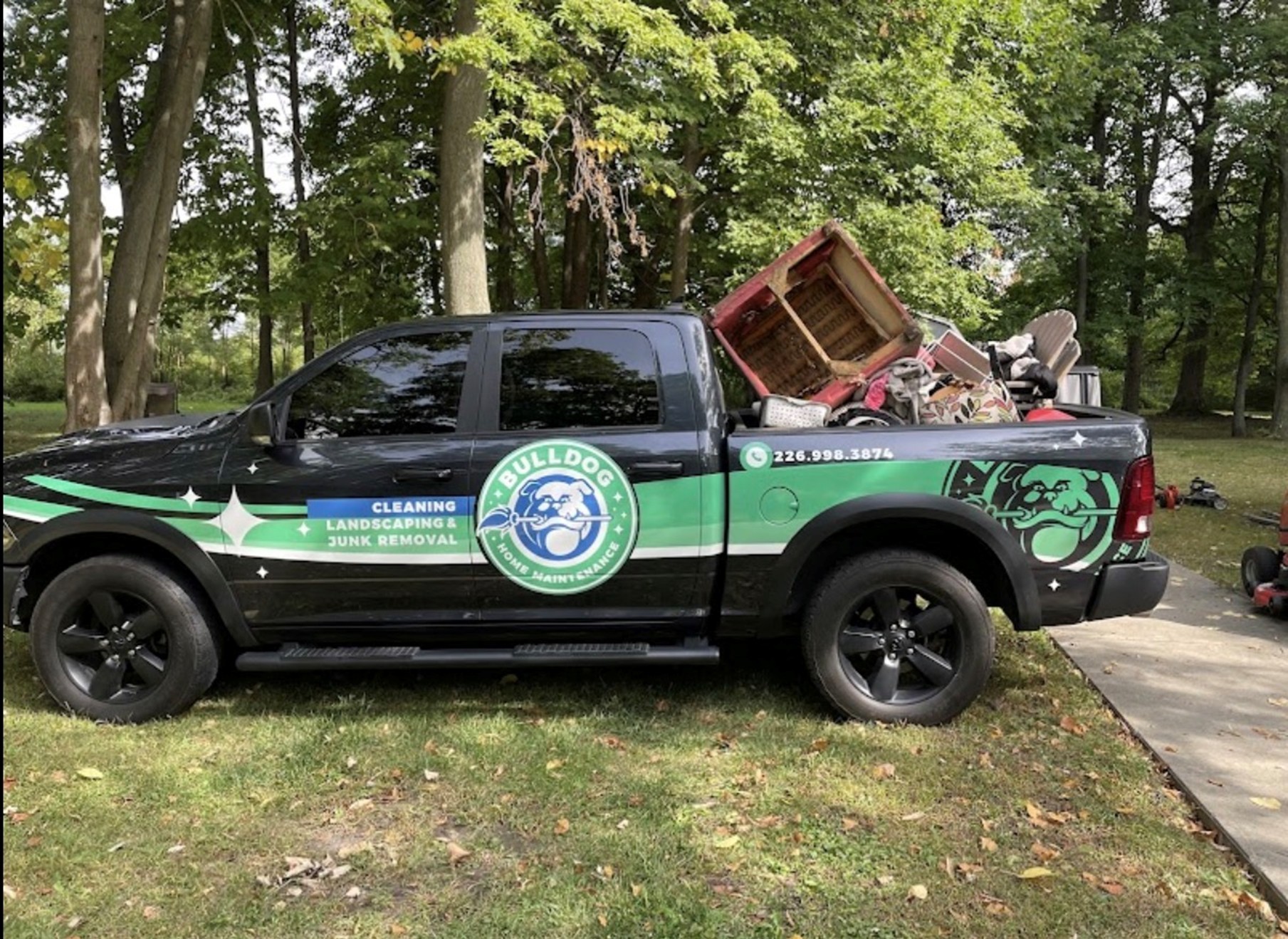 blue Schwinn bicycle frame leaning on black metal frame