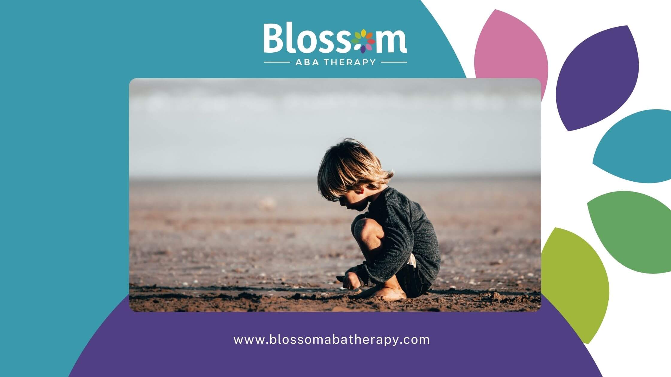 Autistic young boy crouches on sandy beach, focused on the ground in a quiet moment of play after ABA therapy.