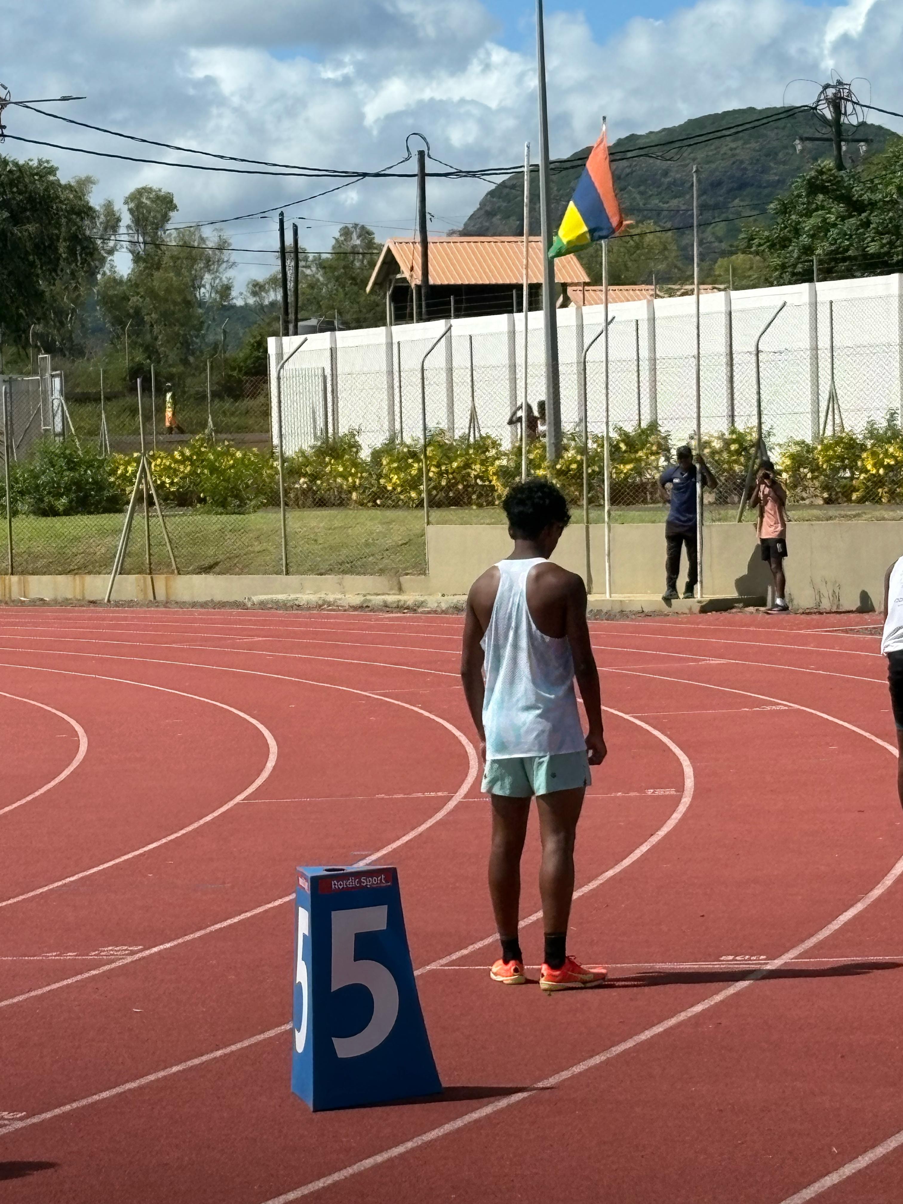 A runner with a blue sky in the background