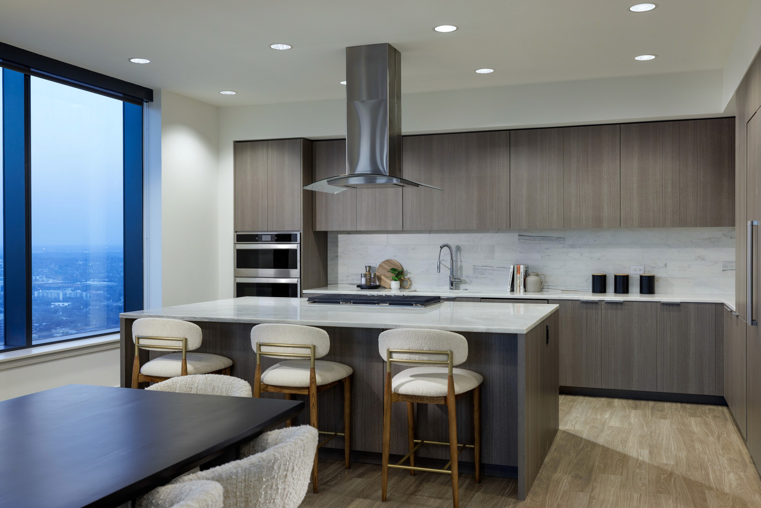 Modern kitchen with island and city view