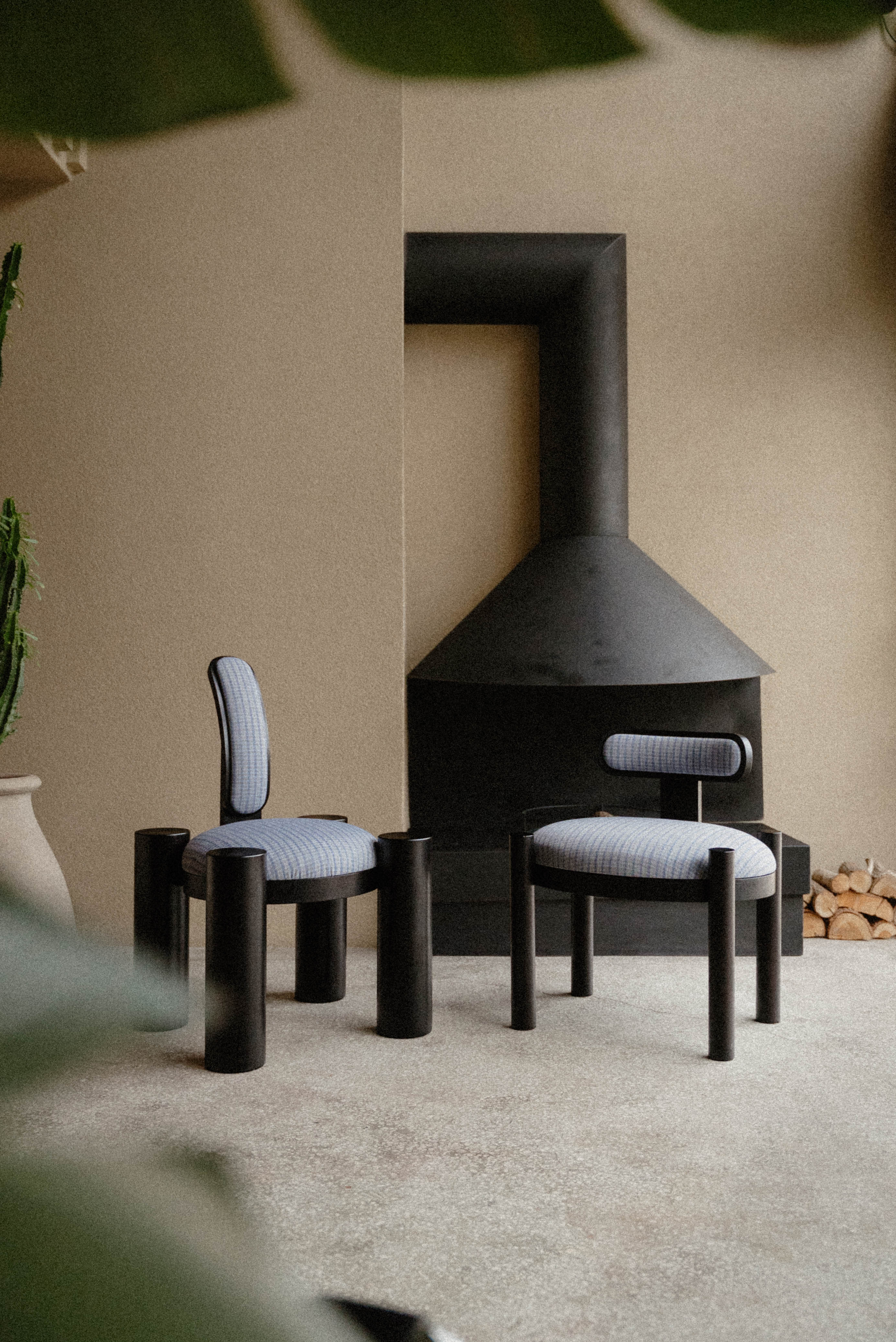 Ancient circular ruins in a dry, desert landscape.