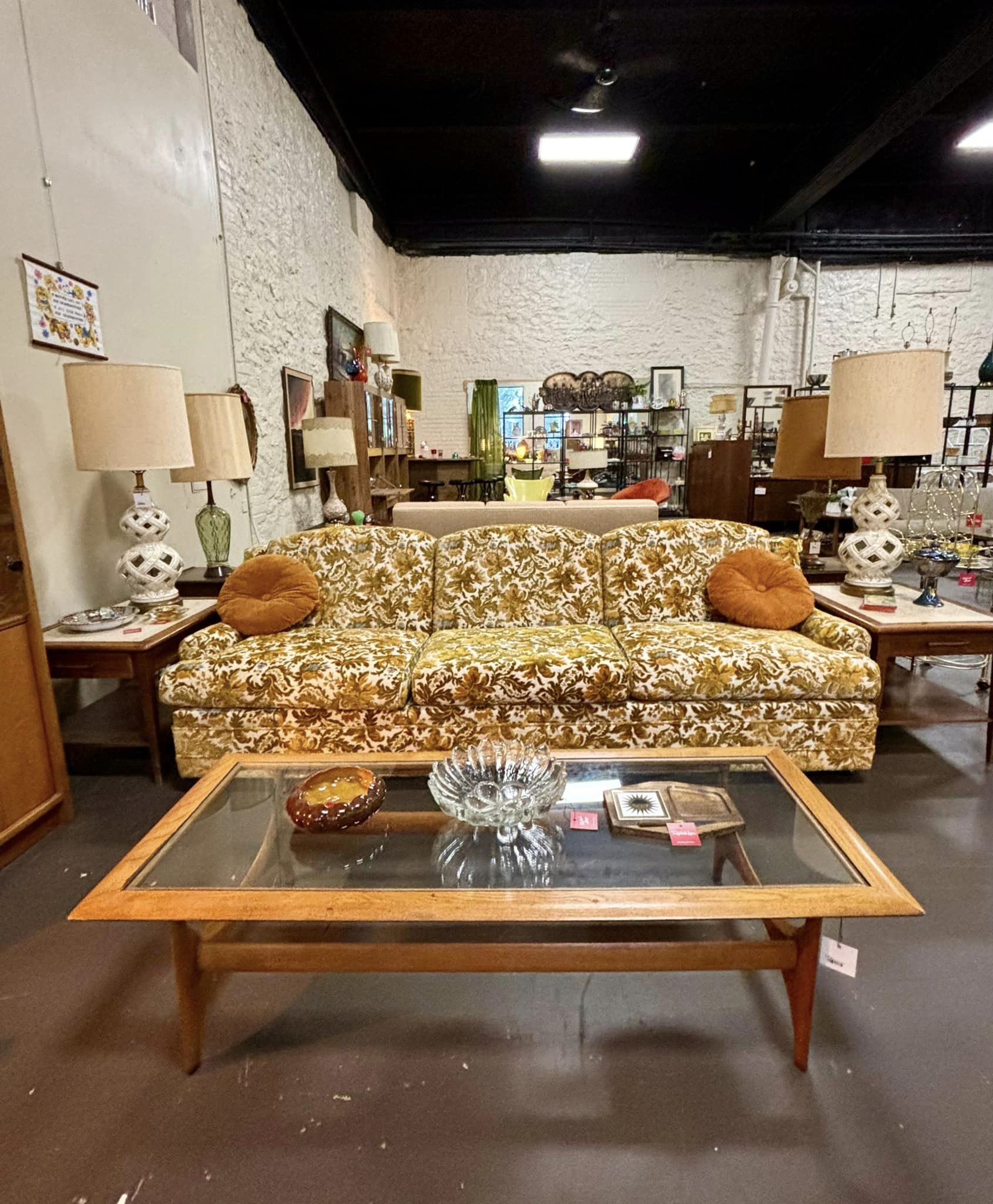 Mid century floral sofa and atomic coffee table