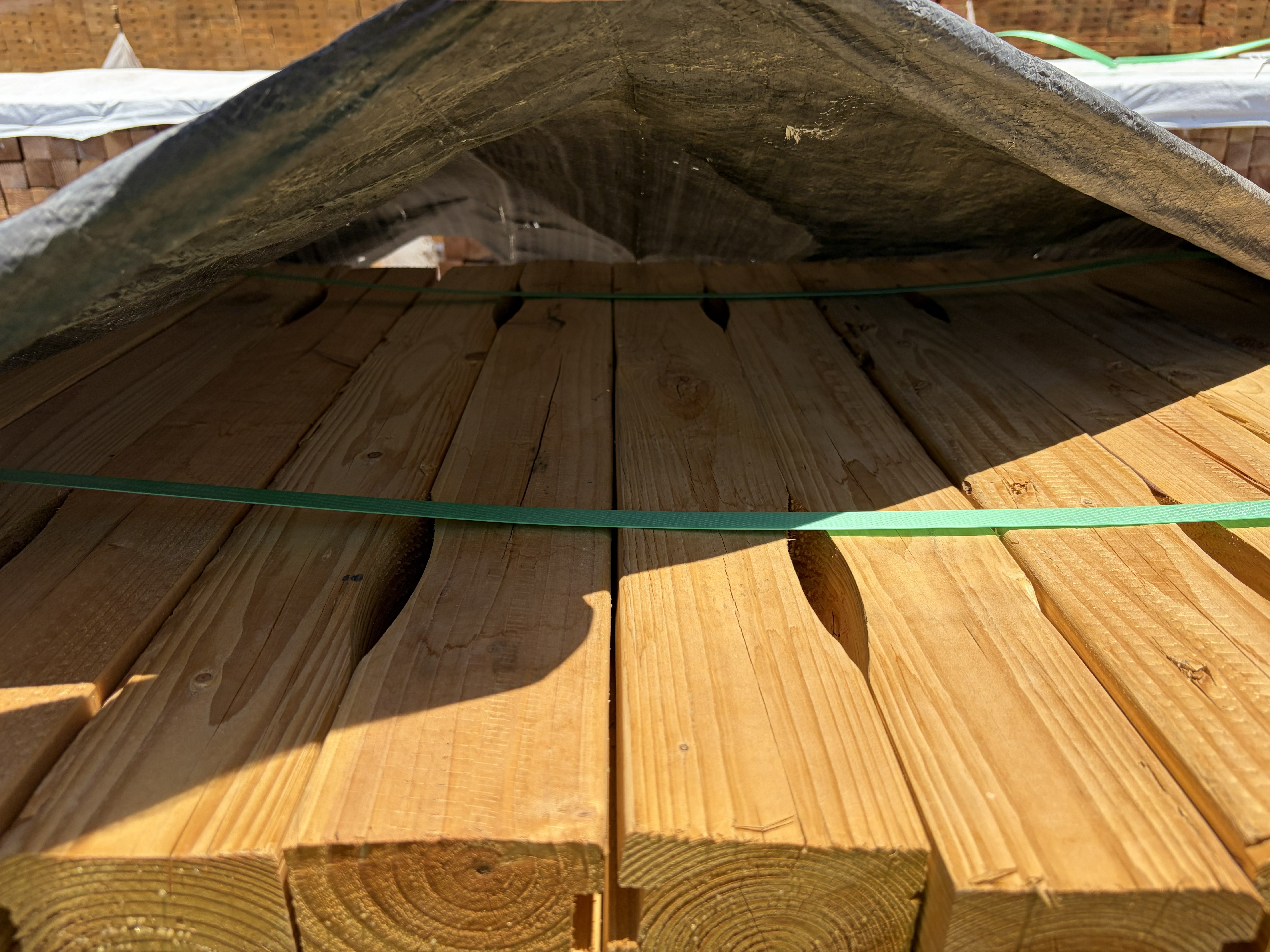 Close-up of grooved wood packaging material for reliable cargo strapping