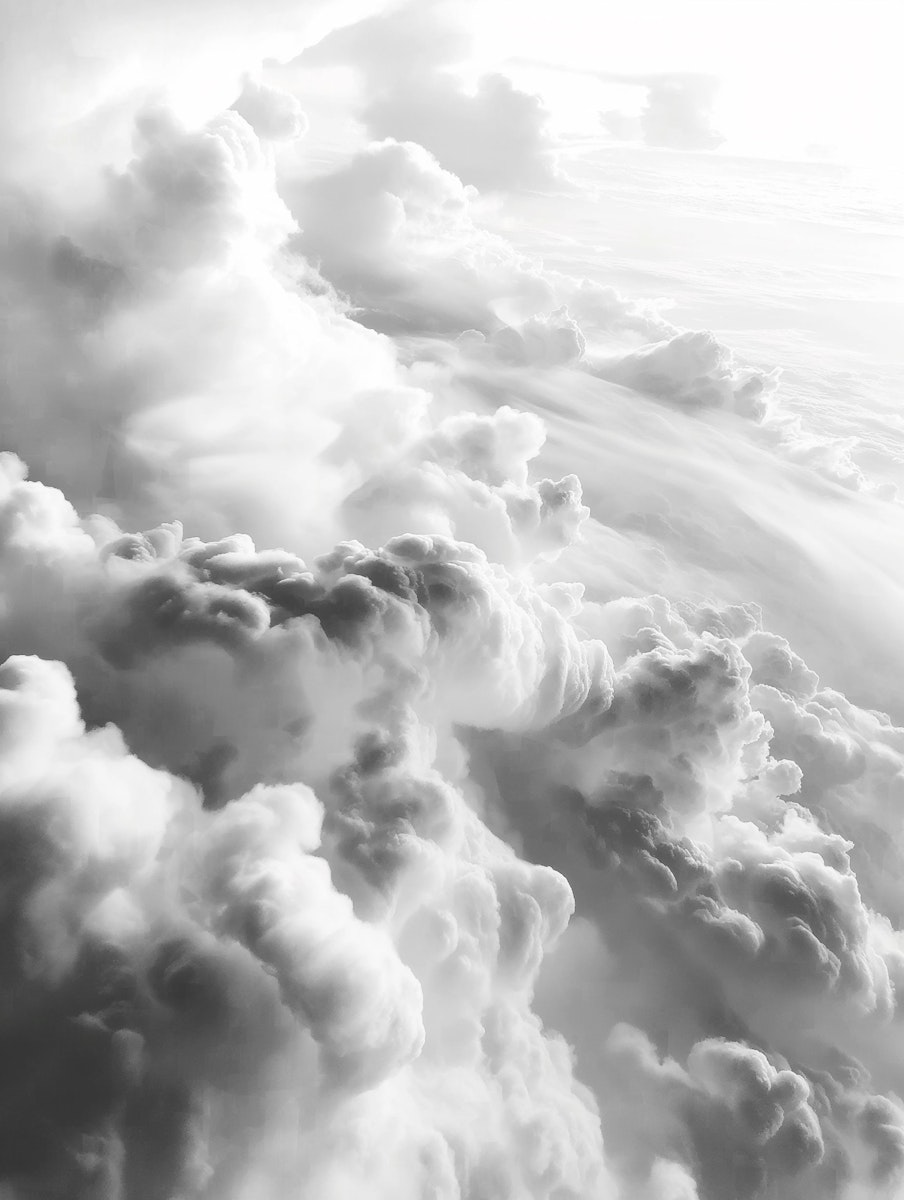 Soft white clouds on a light background, decorative visual for website design