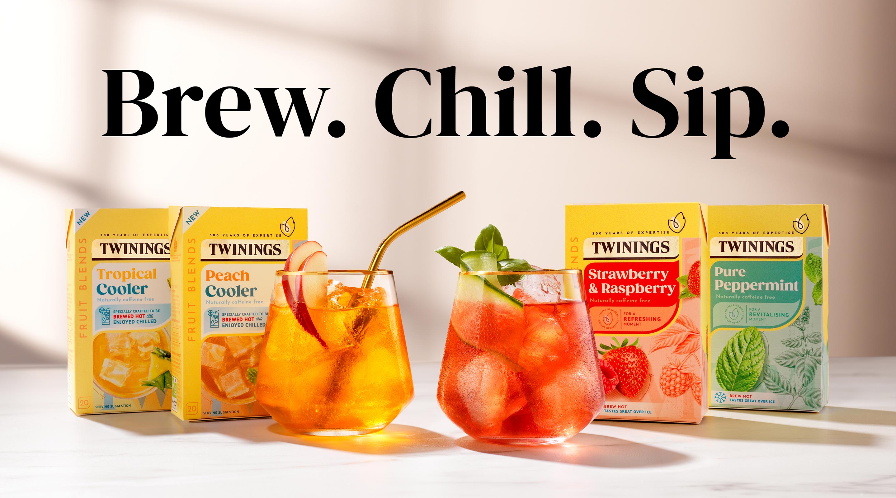 A range of the Fruit Tea boxes. With the words Brew. Chill. Sip.