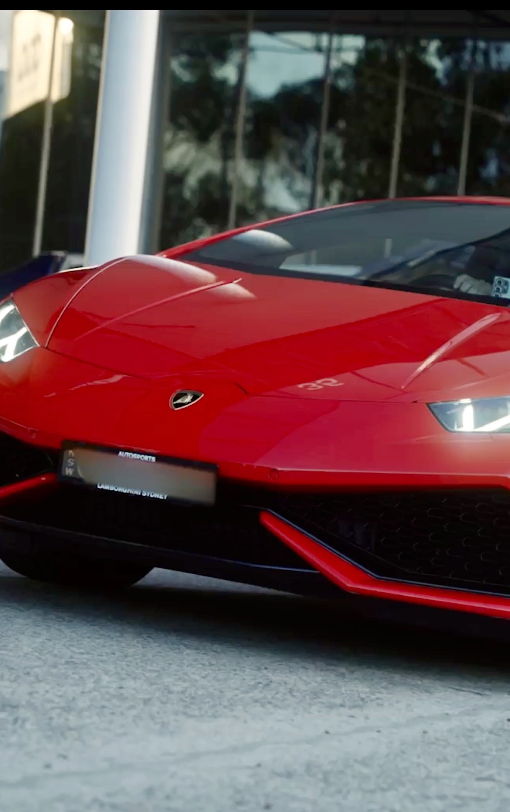 Luxury seaside villa with infinity pool and mountain views, presented in a mobile real estate mockup.