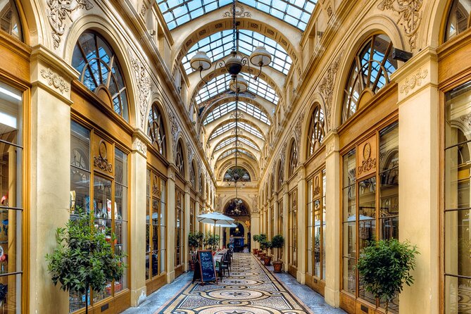 red train travelling near body of water