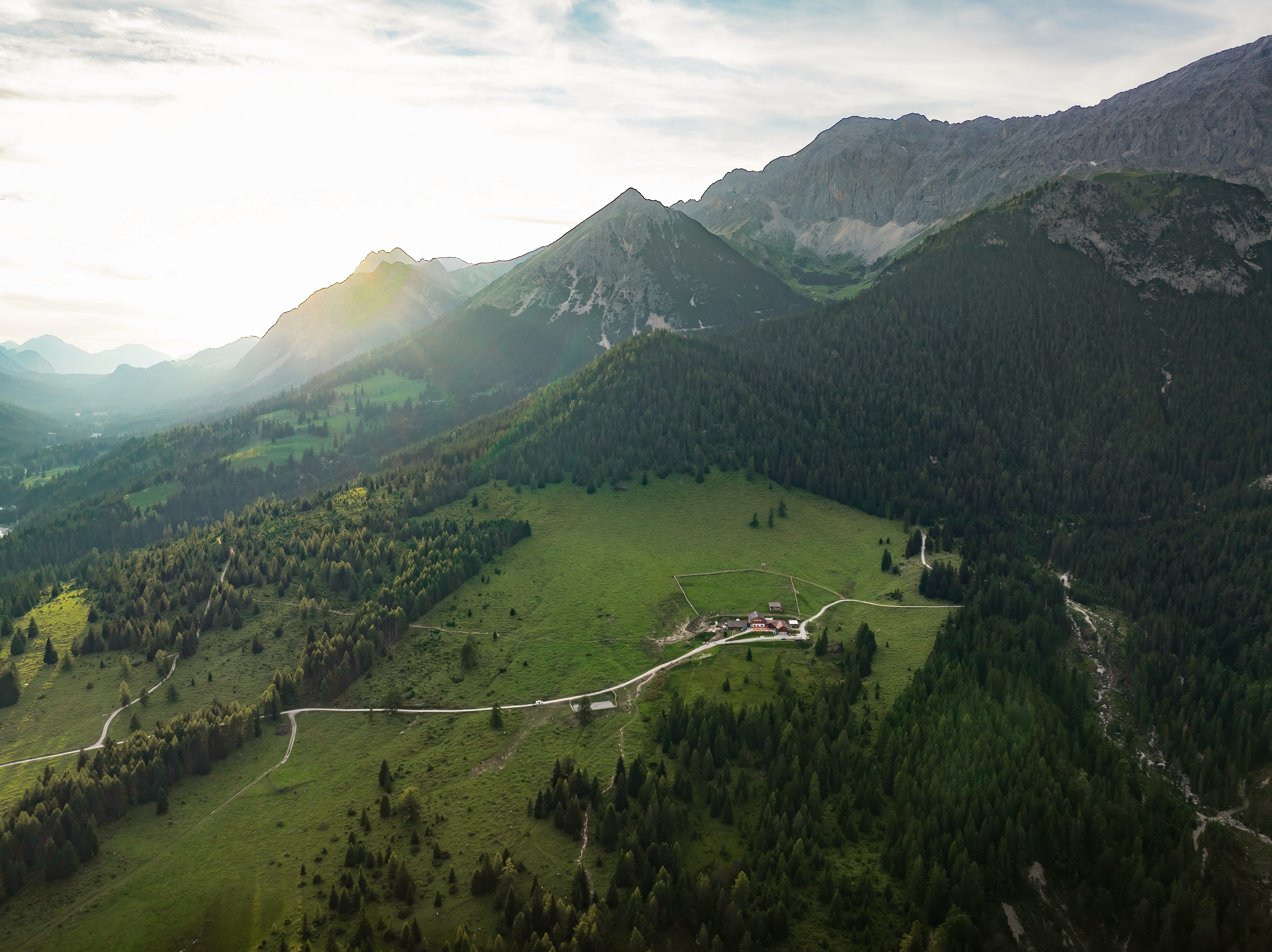 photo of mountains with cloudy sky