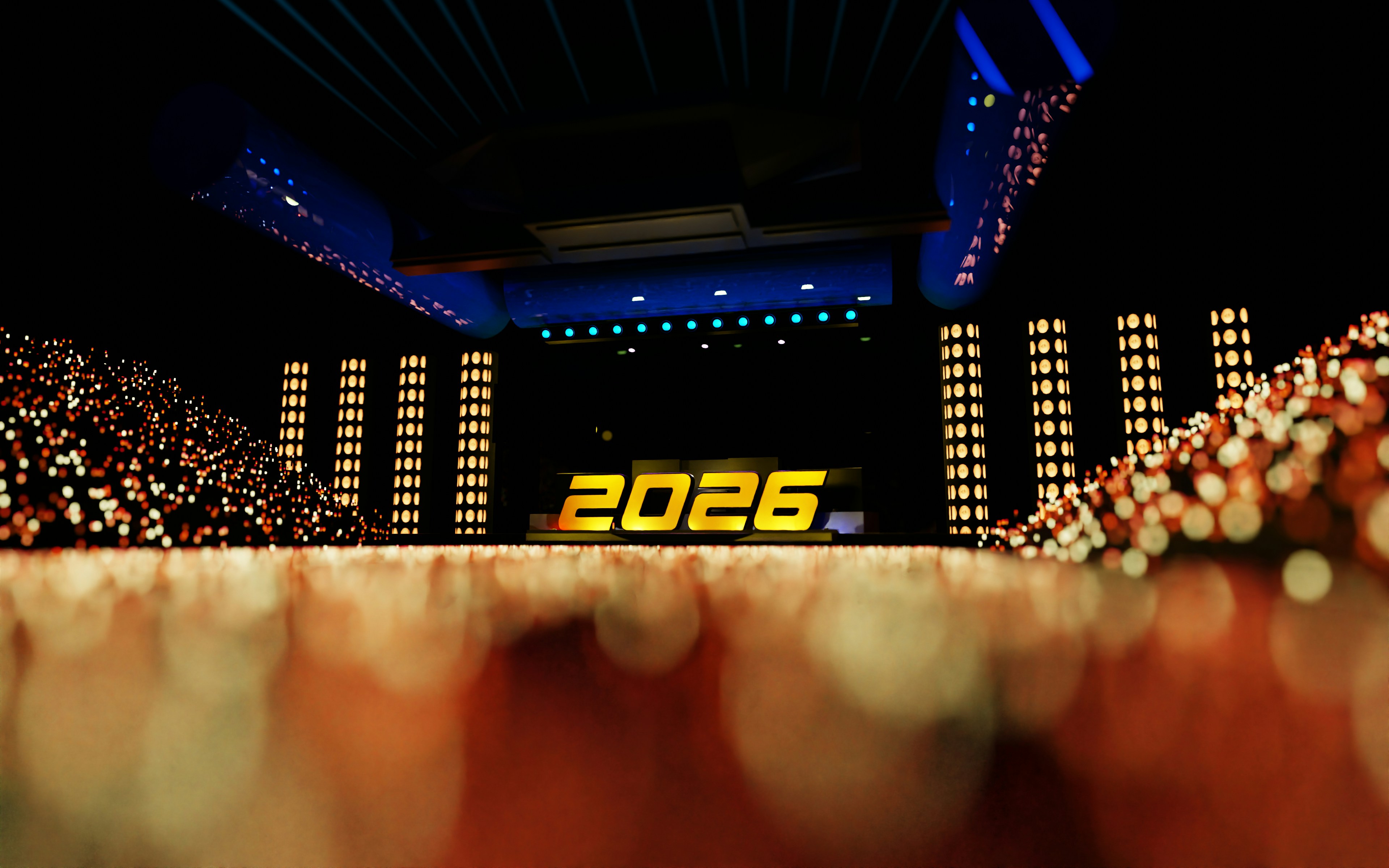 The year 2026 displayed on a stage
