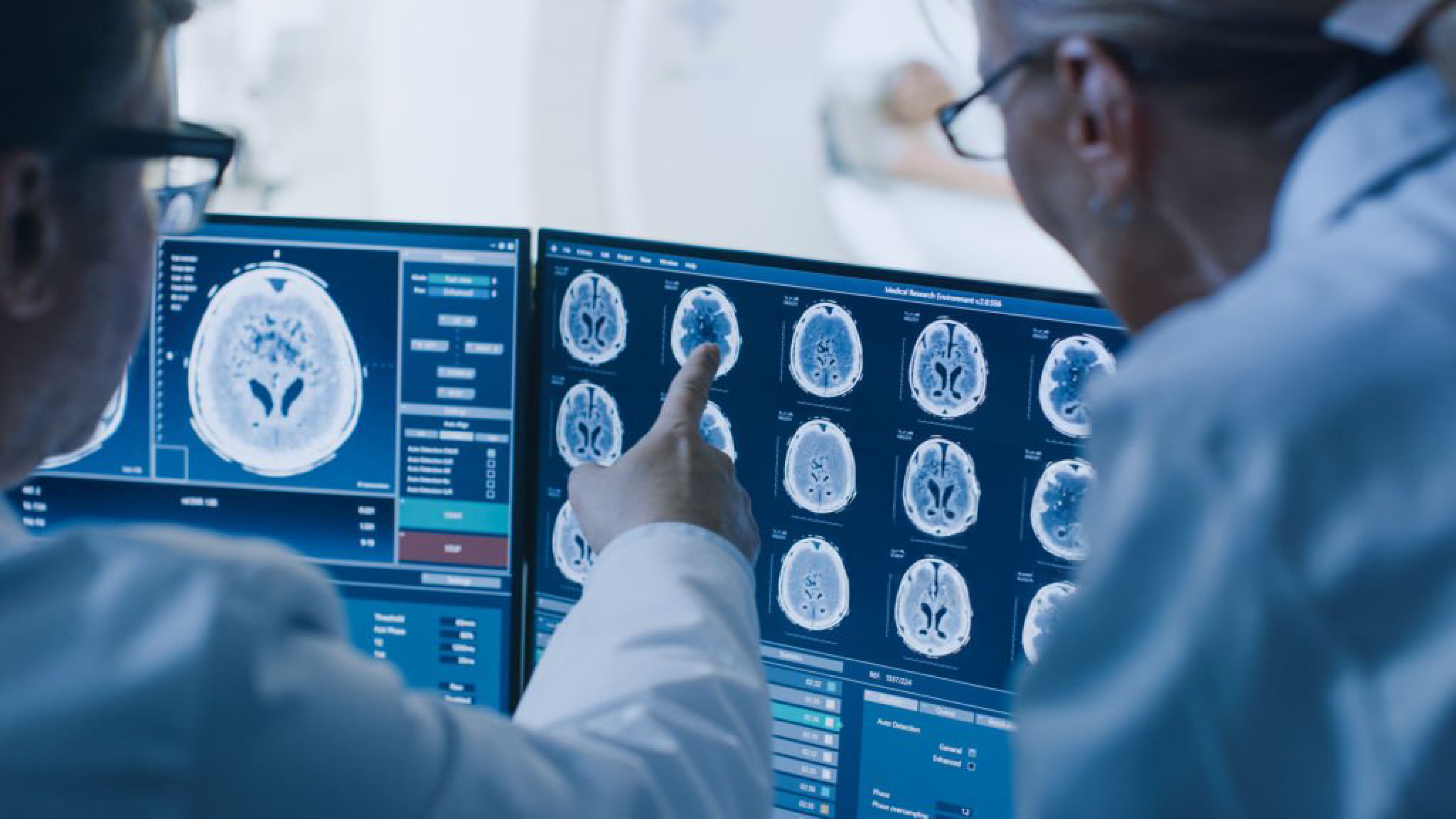 Doctors analyzing AI-powered brain imaging scans for medical diagnosis and research.