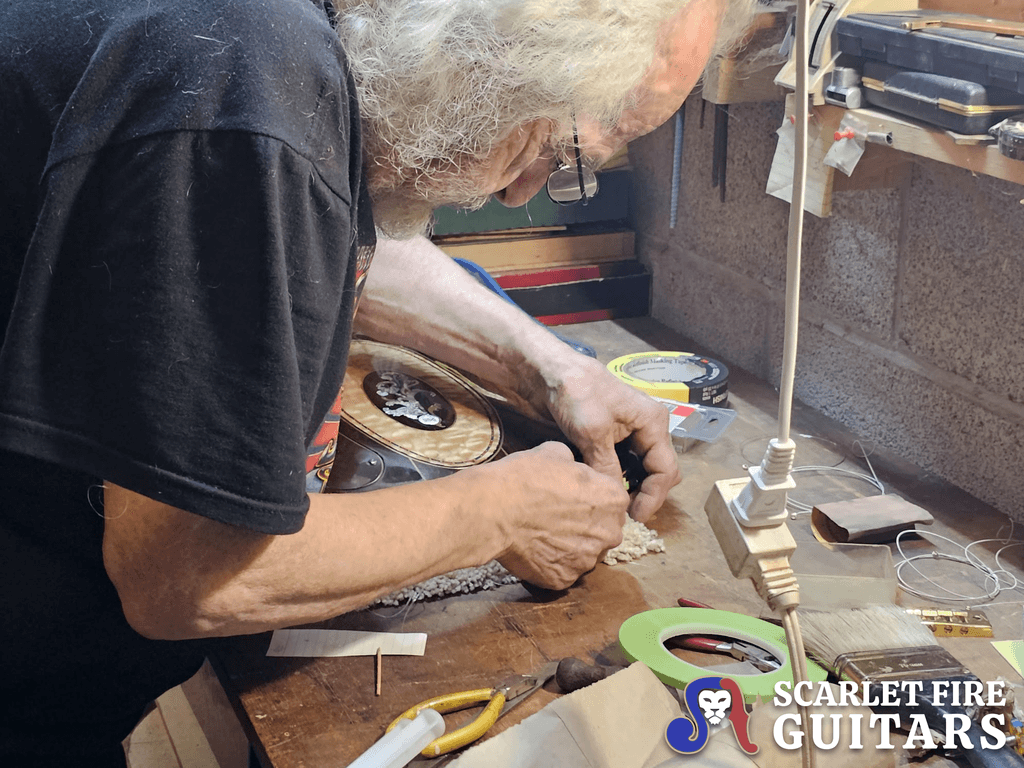 Doug Irwin restoring Jerry Garcia's Tiger guitar in his shop