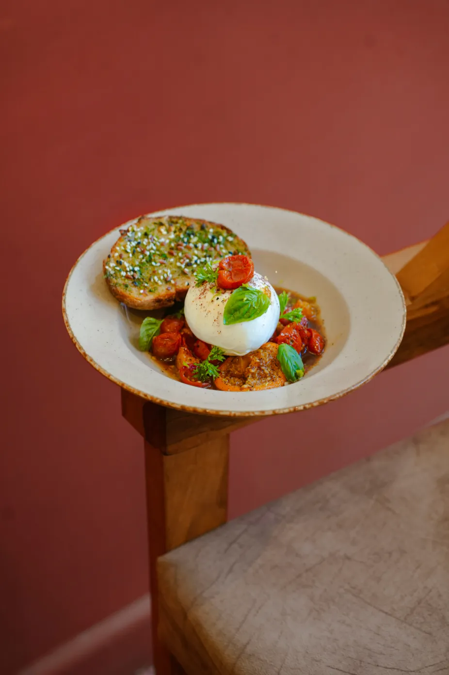 Burrata with blistered tomatoes and herb toast