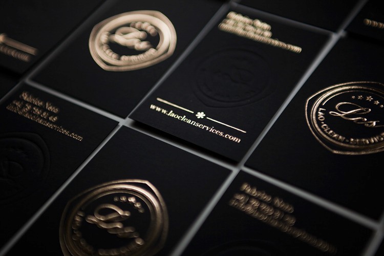 an image of black and gold business cards with a premium finish