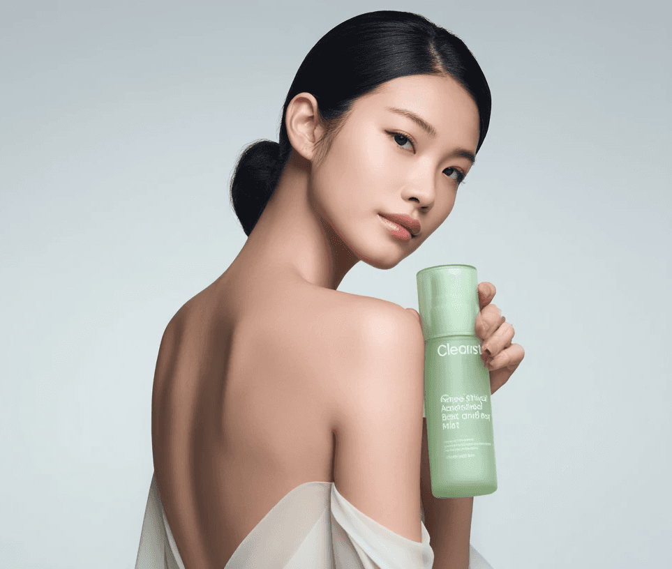 Beautful woman smiling and holding her cheeks