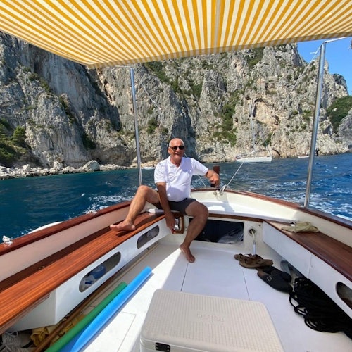 Skipper on board the typical gozzo caprese