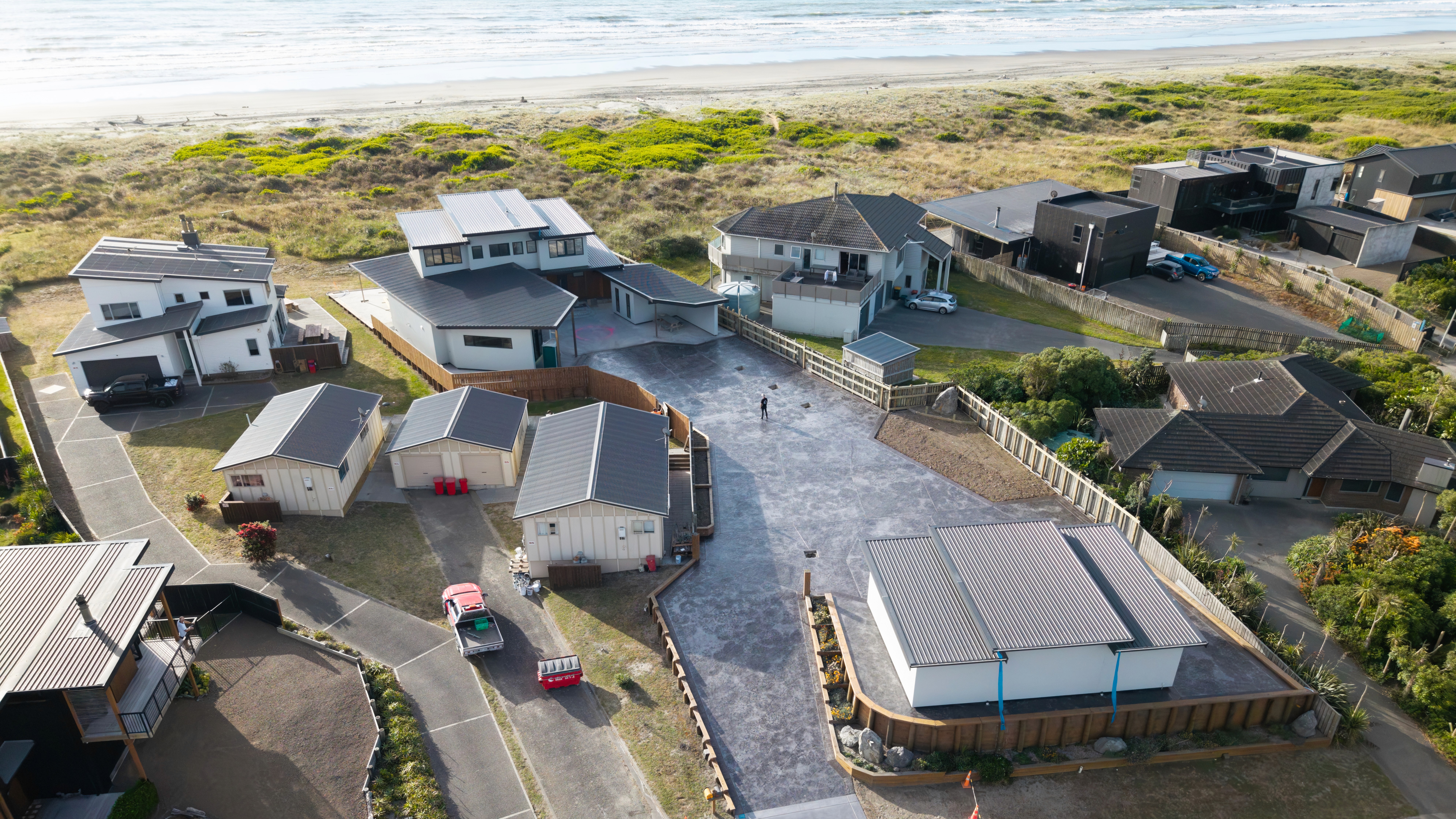 Streetside billboard with flyposters of the Batch.Works brand and illustrations