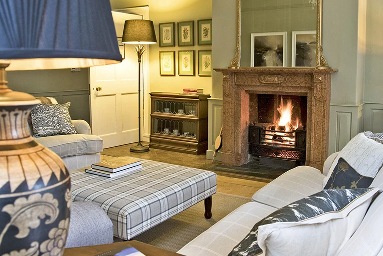 Hartingtons Heritage Tours hotel, Darley House, Sitting room and fireplace