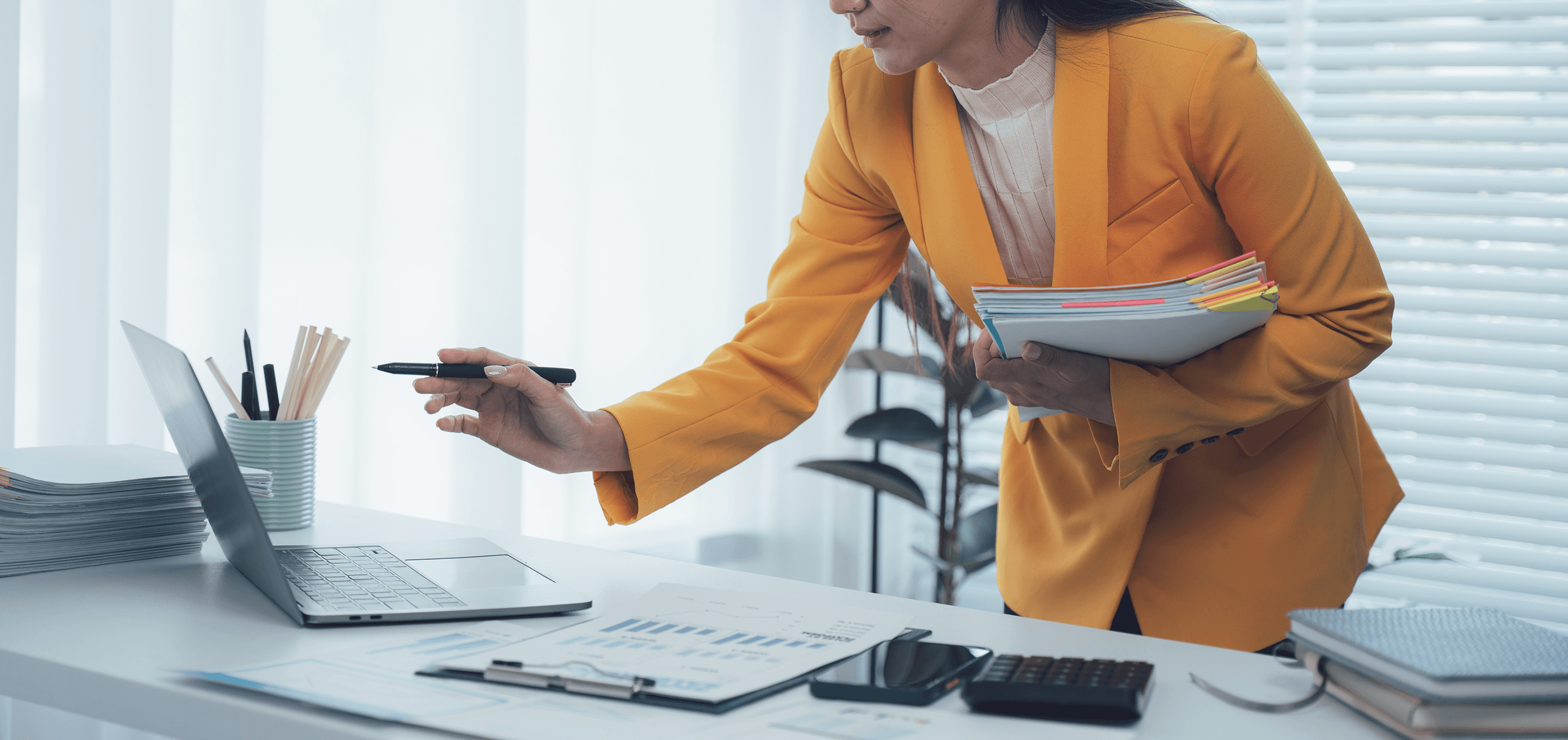 Woman carrying documents