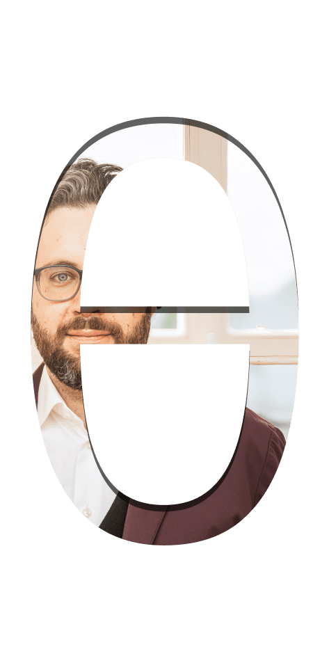 Theta Symbol mit einem inneren Bild von Prof. Dr. Dr. Oliver Hoffmann