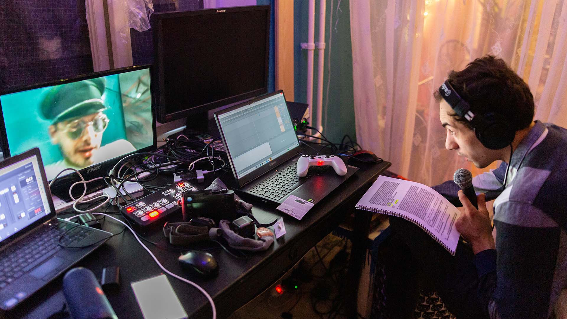 A person stands in a sandstone cave.