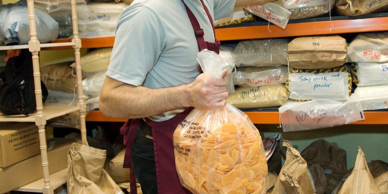 A F&B business staff managing stock and inventory