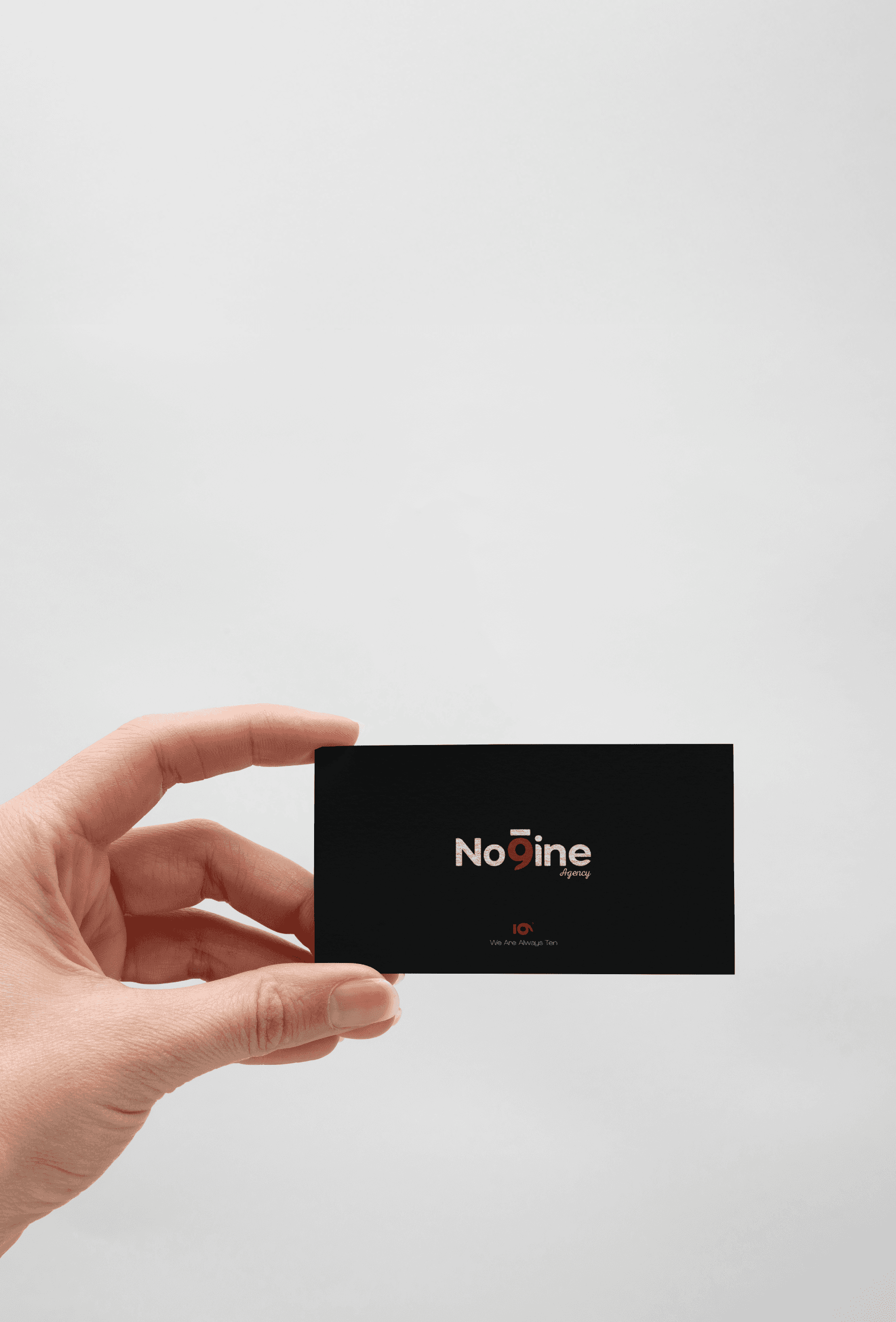 Female hand shows a card