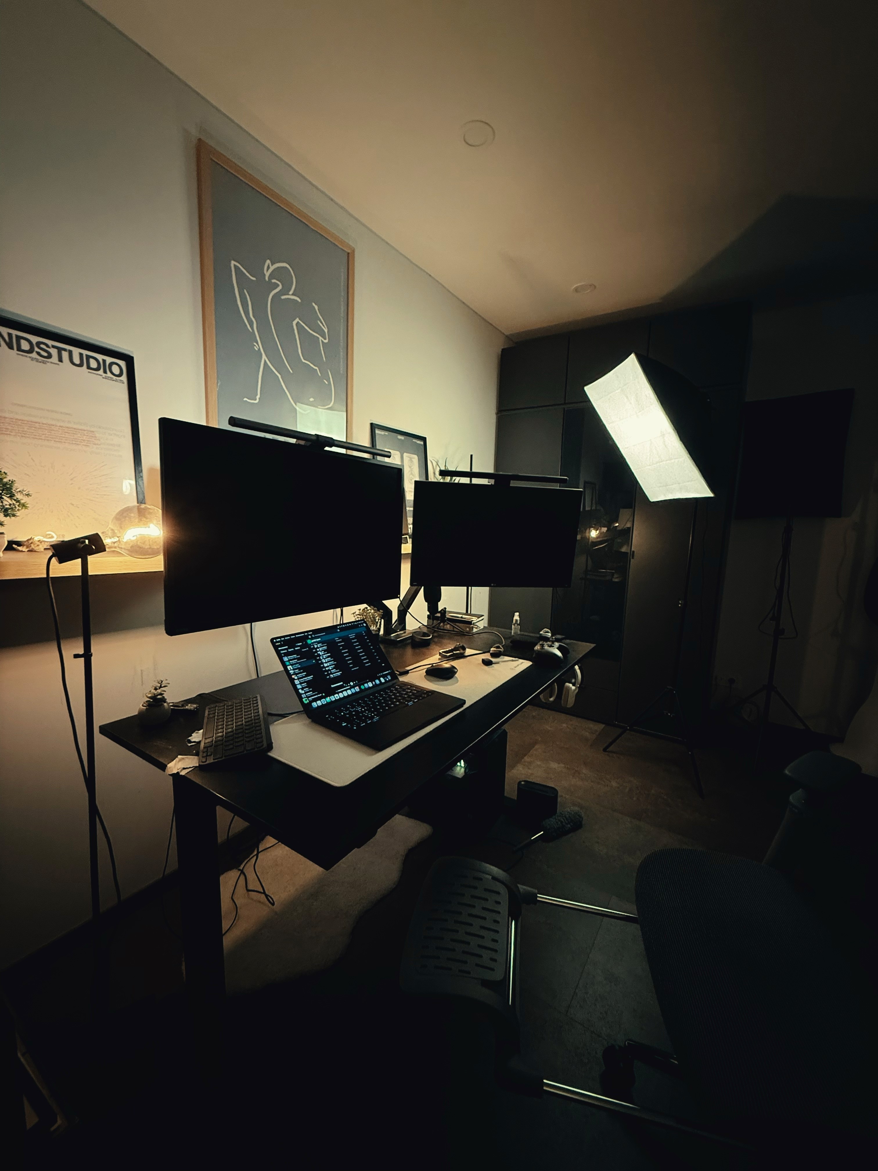 black flat screen computer monitor on brown wooden desk