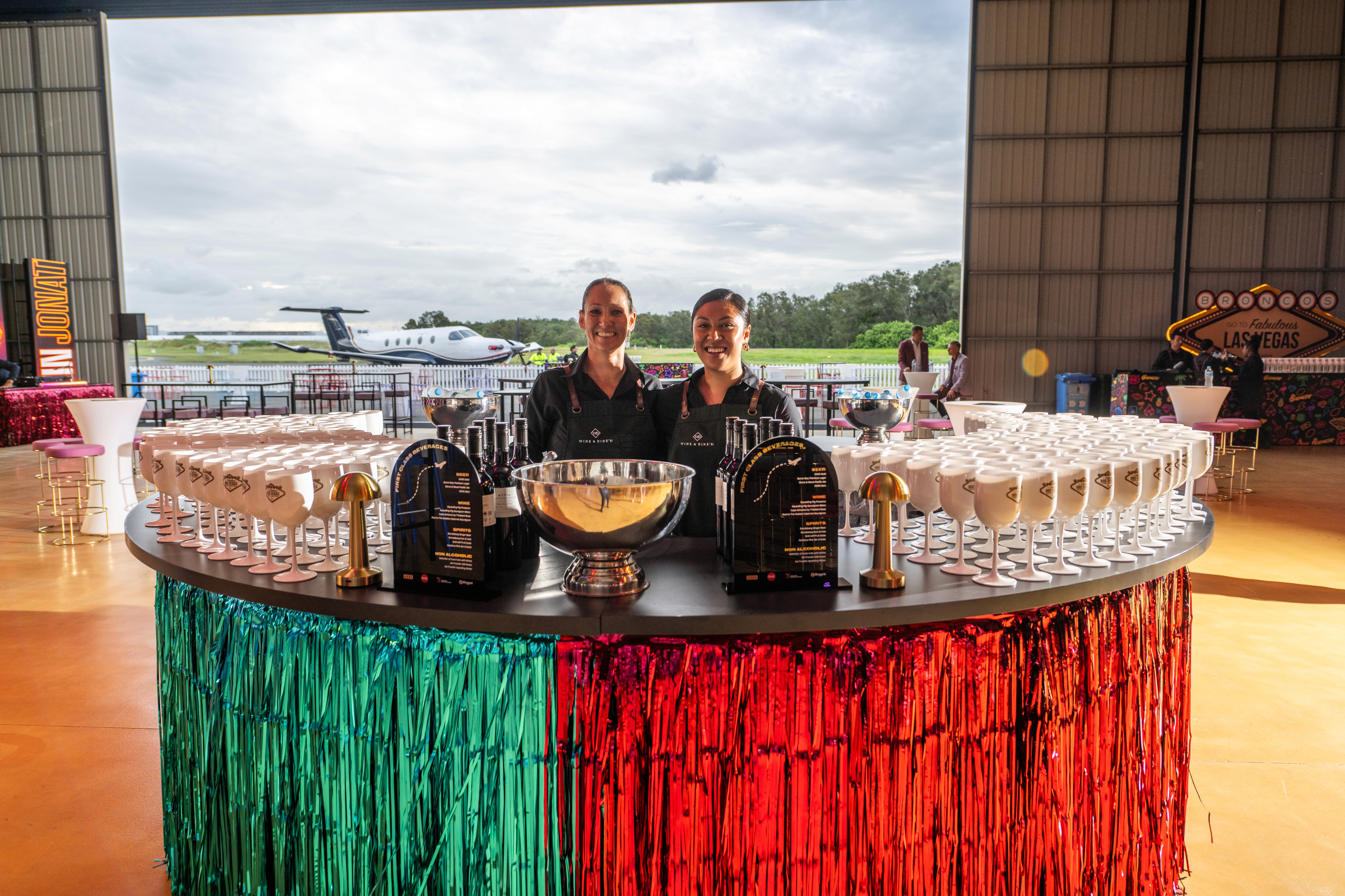 Bar staff at the Broncos Season Launch