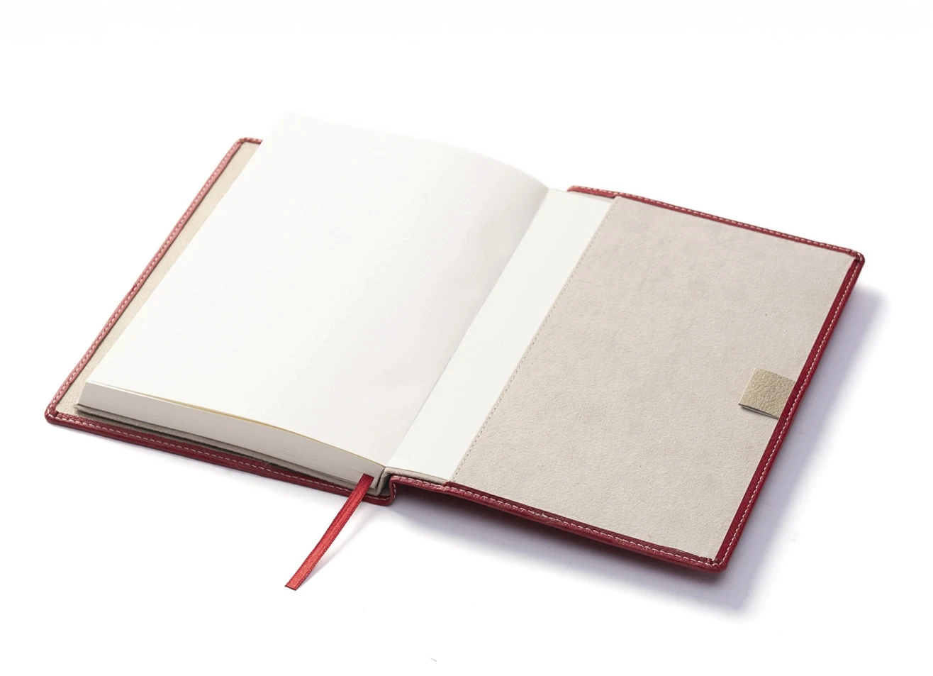 Open notebook showing blank pages and back cover pocket slot.